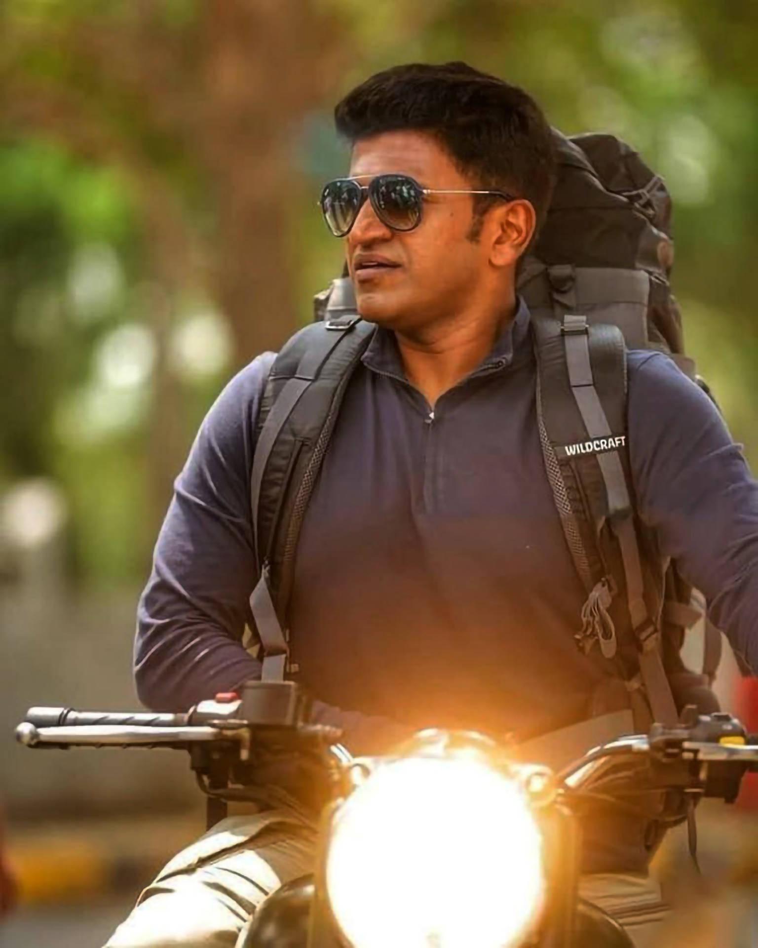 1536x1920 Download Puneeth Rajkumar Riding Motorcycle Wallpaper