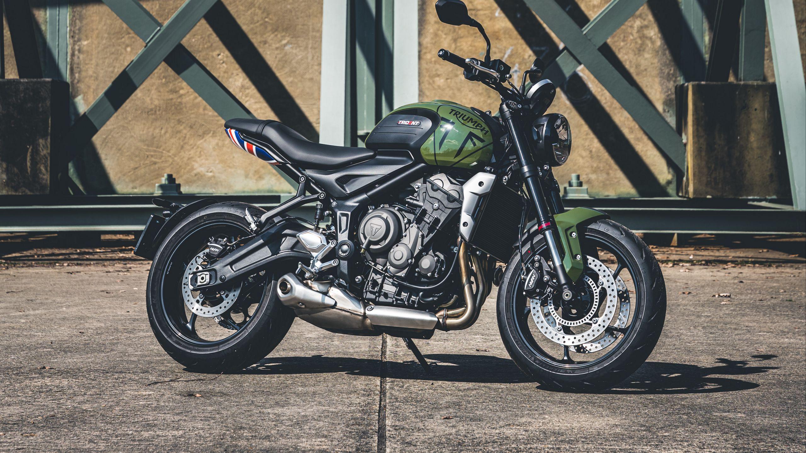 2560x1440 Download wallpaper 2560x1440 triumph, motorcycle, bike, green widescreen 16:9 HD background
