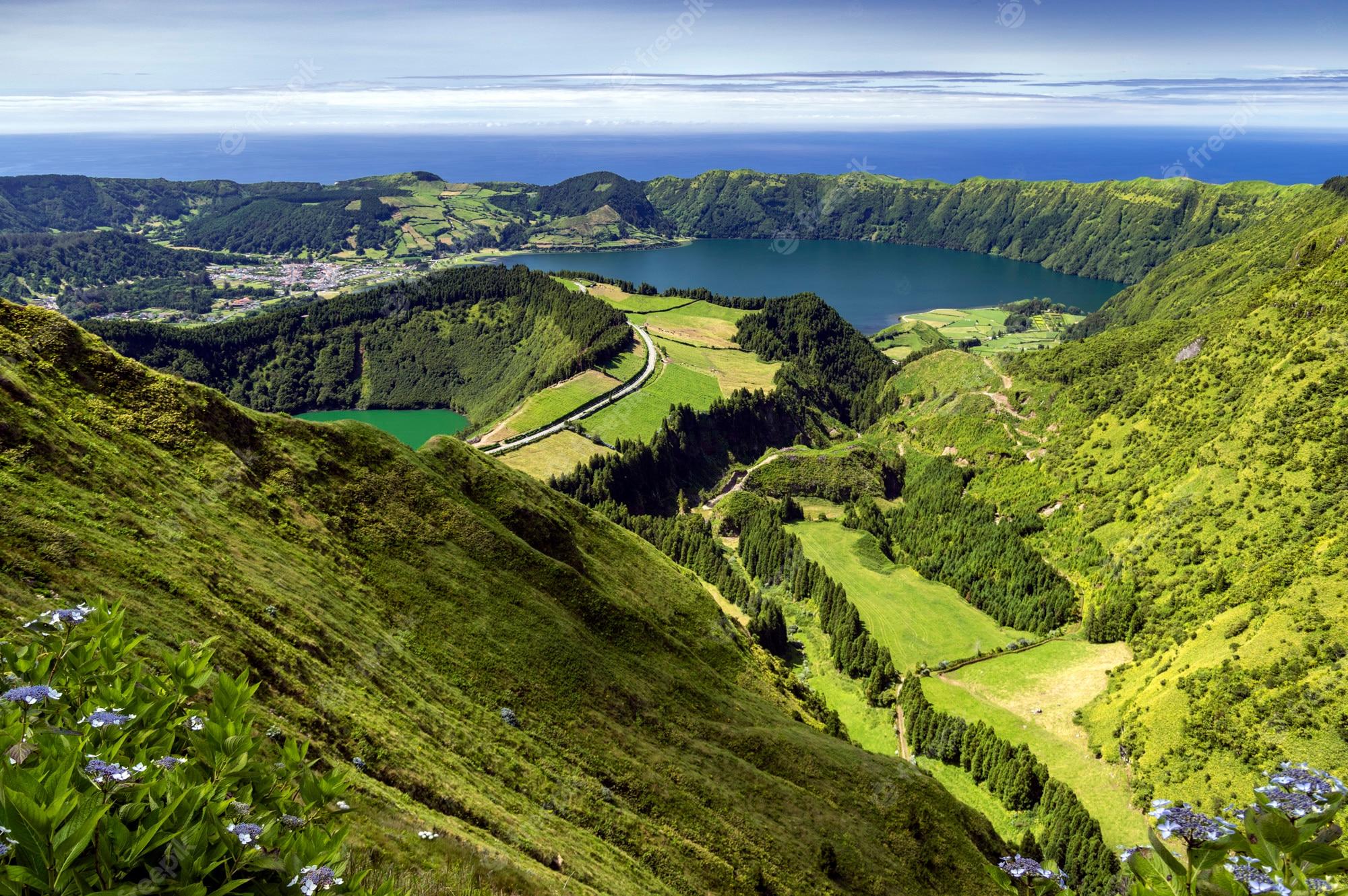 2000x1330 Premium Photo. View of lagoa de santiago and lagoa azul from the green mountains in sao miguel, azores islands, portugal