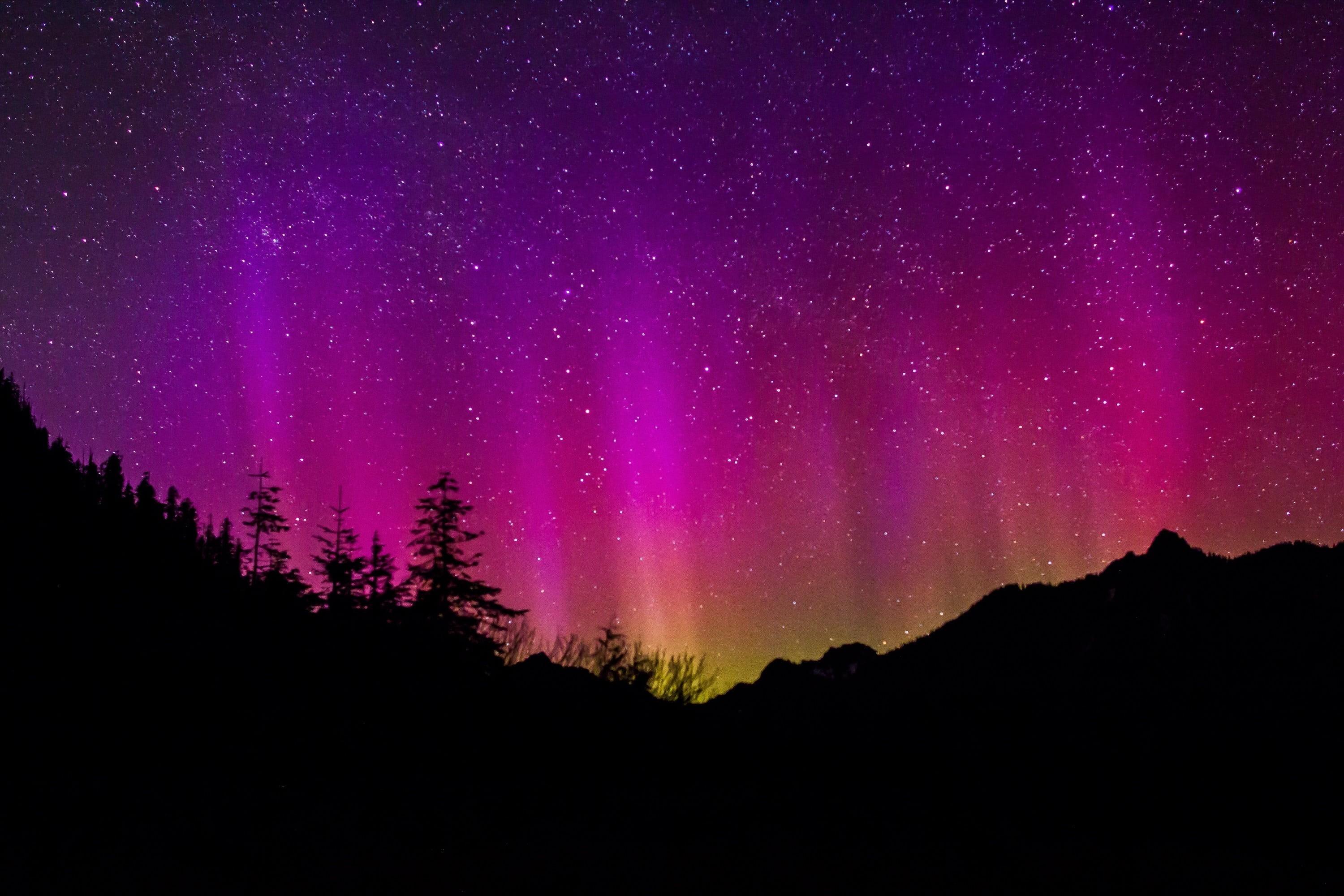 3000x2000 Wallpaper / galaxy, silhouette, nature, skyline, aurora Borealis, hills, illuminated, northern lights, silhouettes, landscape, sky, purple, 2K, tranquil scene, stars free download