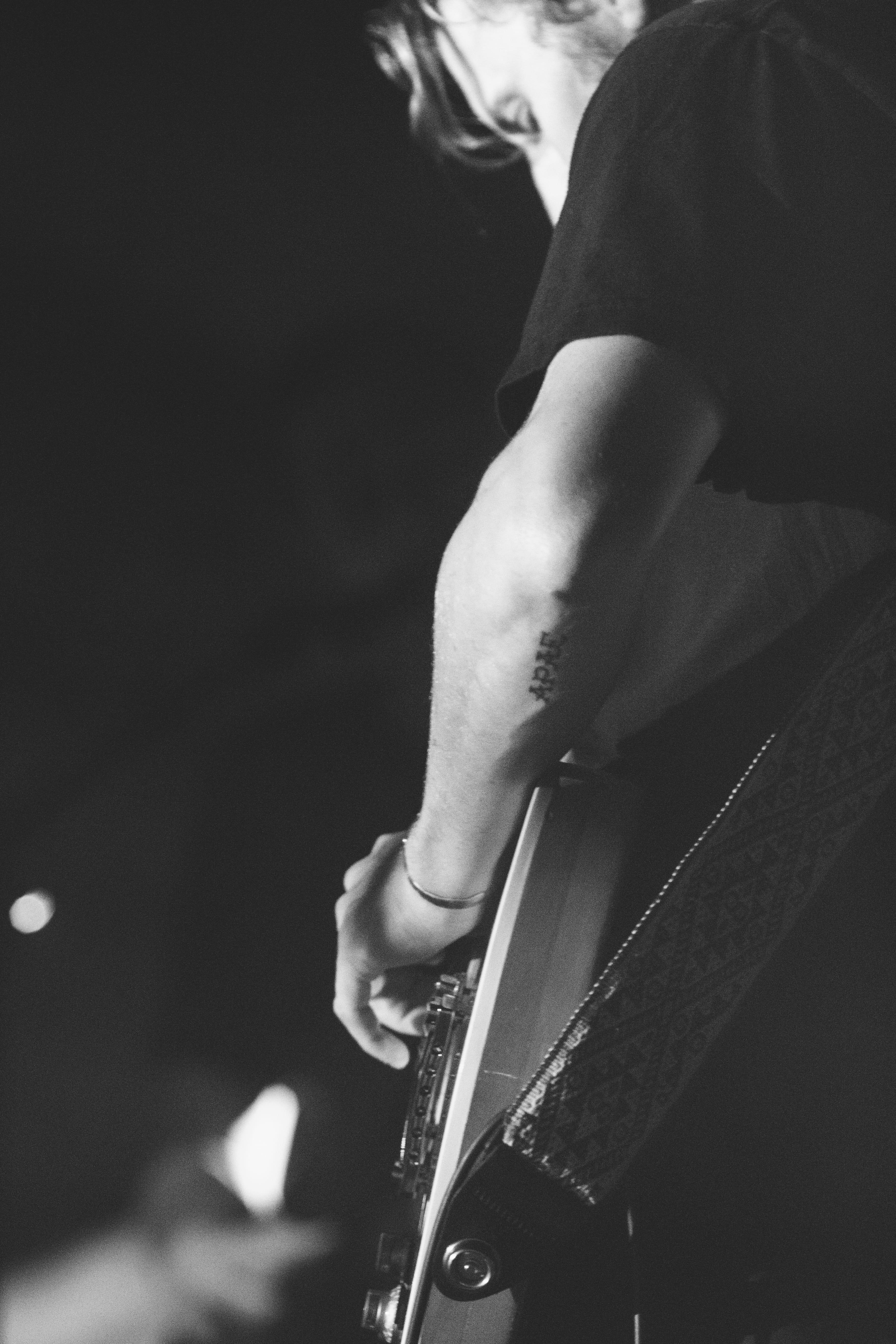 3648x5472 Wallpaper / 5K, playing, human hand, entertainment occupation, stage, musician, music, string instrument, wallpaper, ben howard, guitar, live music, real people, finger free download