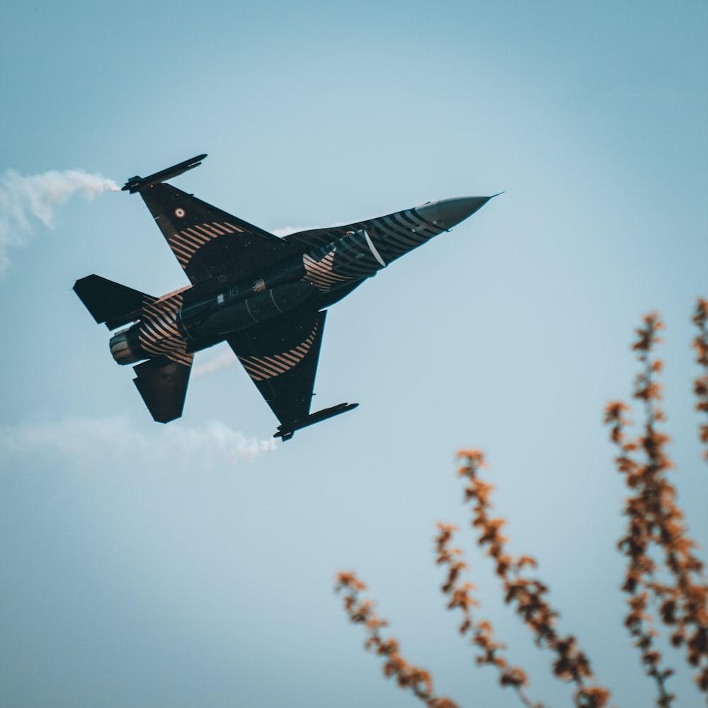 1000x1000 A fighter jet flying in the sky photo