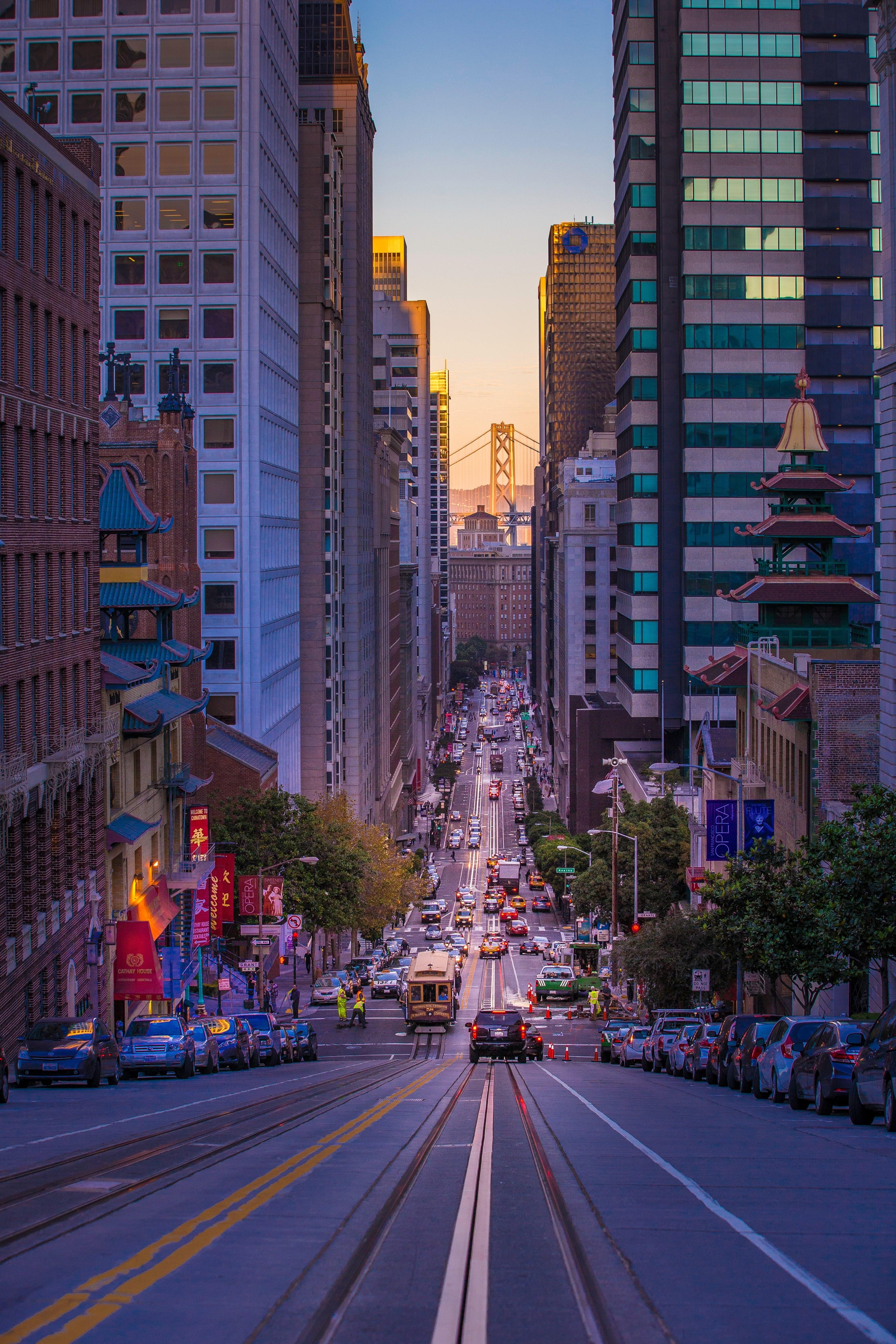 3405x5107 Wallpaper / sloped downtown city street in san francisco with tram traffic and skyscrapers california street at dusk, sloped view california street 4k wallpaper free download