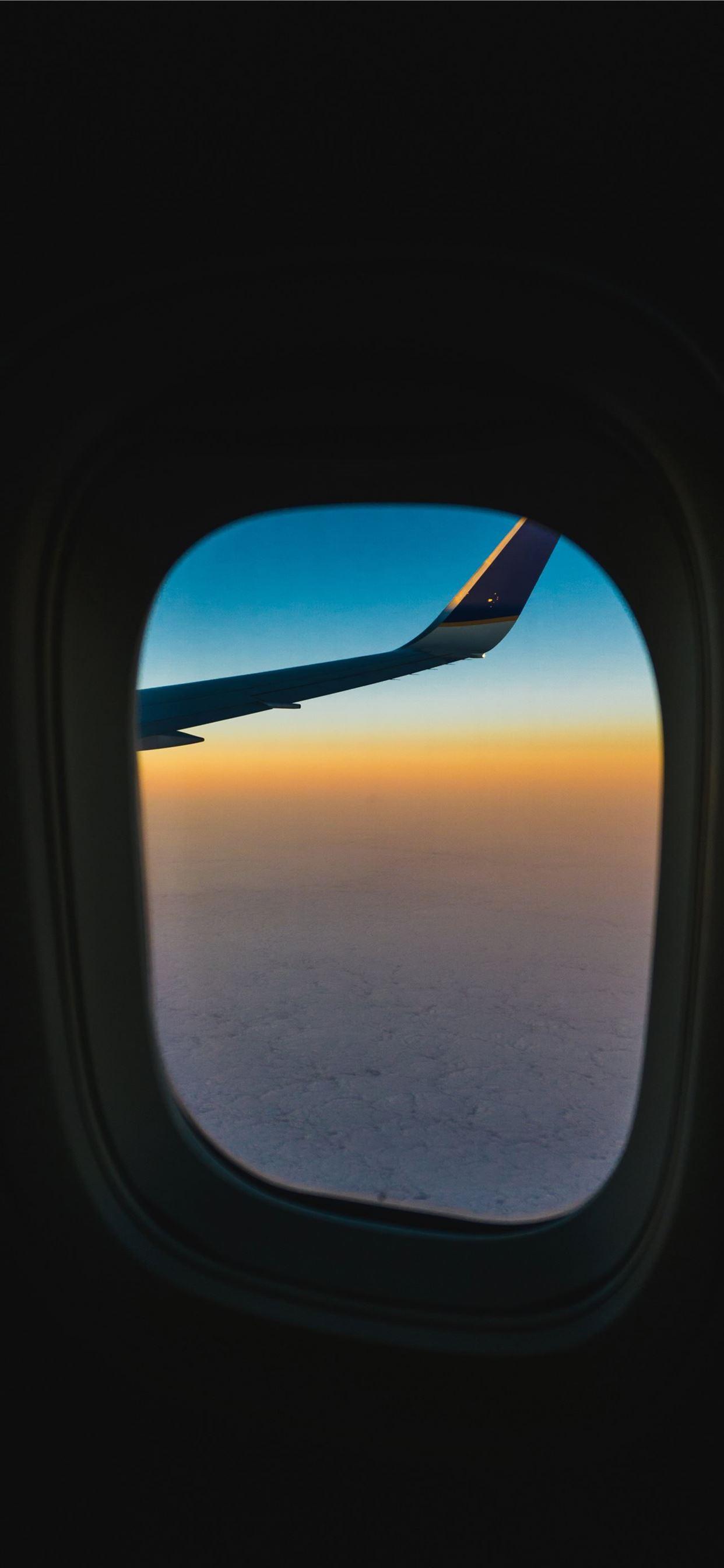 1242x2688 ID 261953 looking out an airplane window at the pl. iPhone Wallpaper Free Download