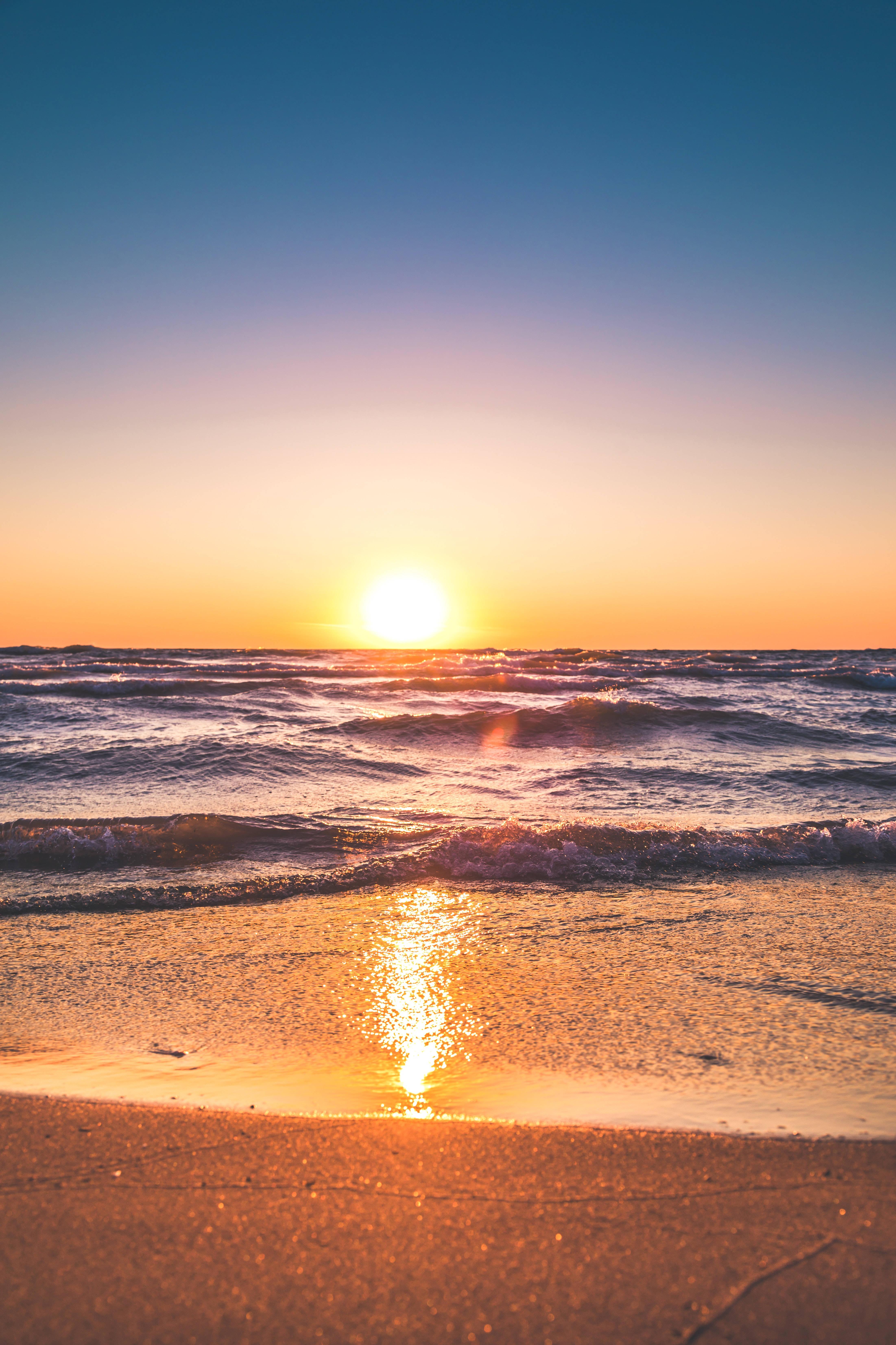 4405x6607 Download Sunset On Waters Beach Android Wallpaper