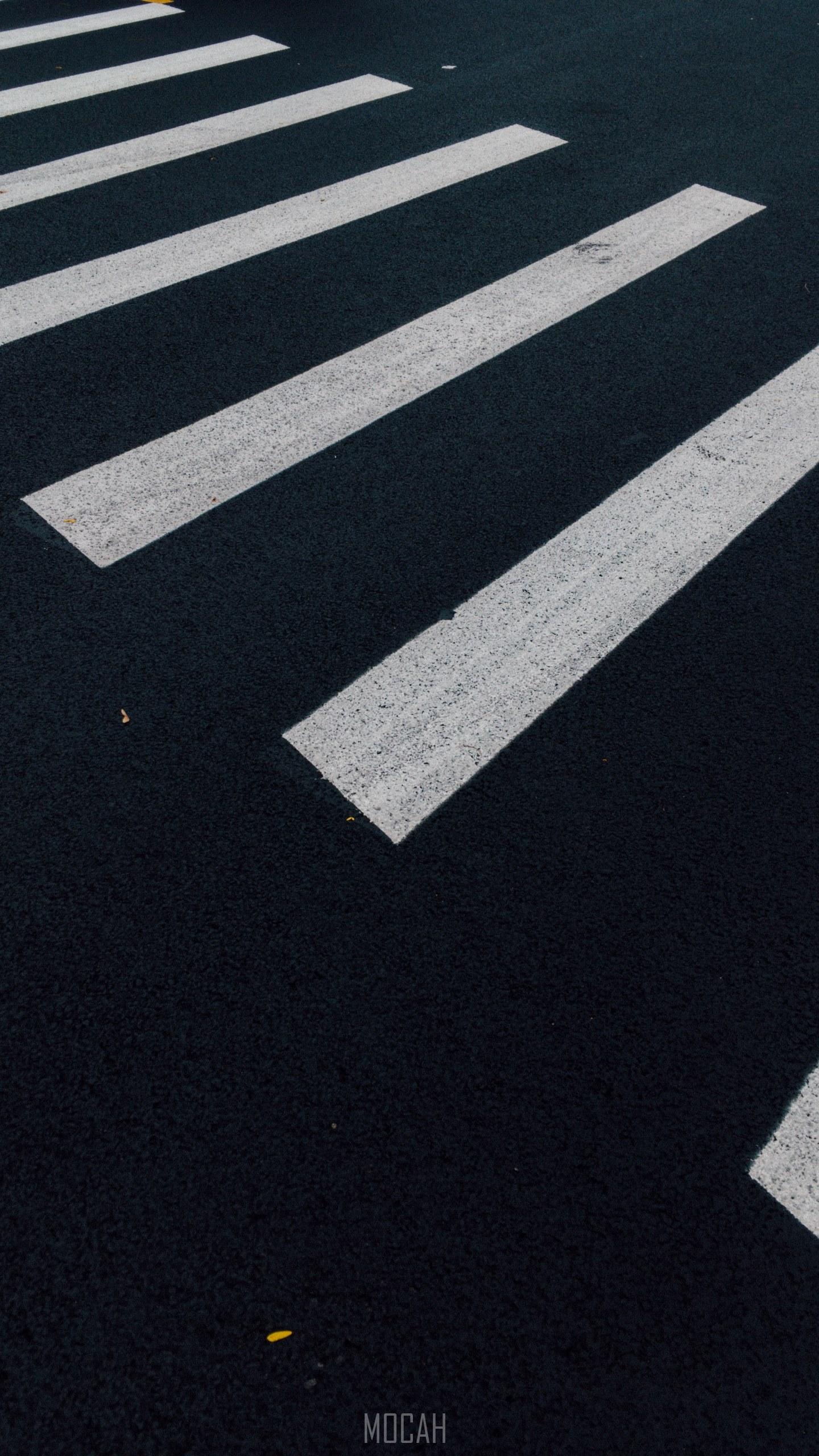 1440x2560 a black and white crosswalk in the street, white lines on road macro, HTC 10 evo screensaver, 1440x2560 Gallery HD Wallpaper