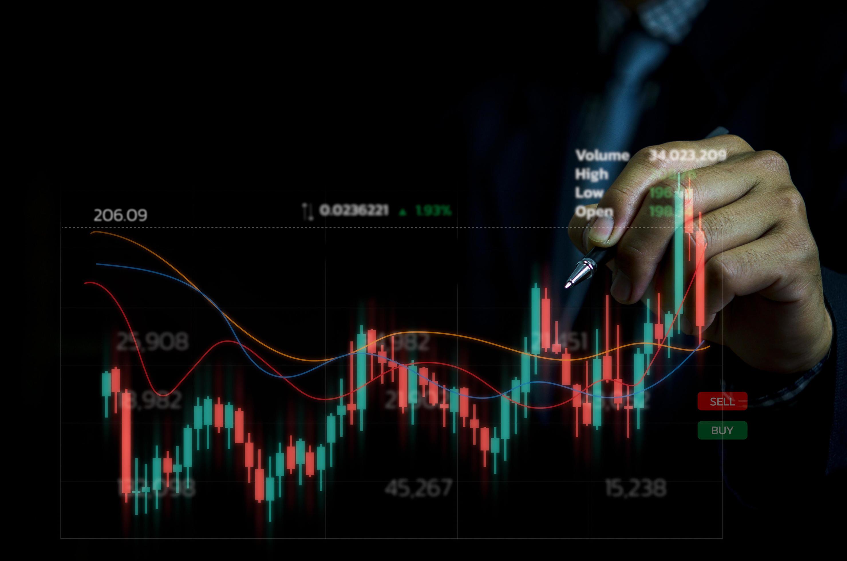 2959x1960 Businessman hand forex trading financial stock market by graph and economic technology investment charts