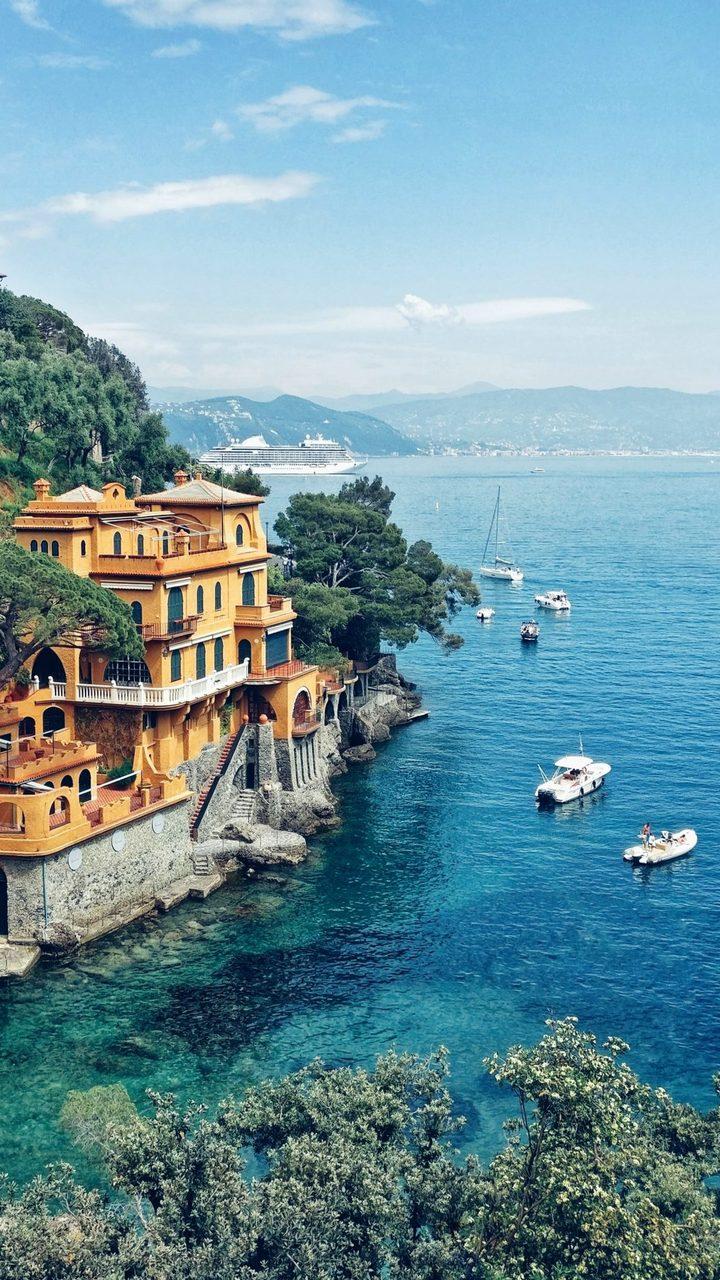 720x1280 Sea shore cliffs with blue water in Portofino, Italy
