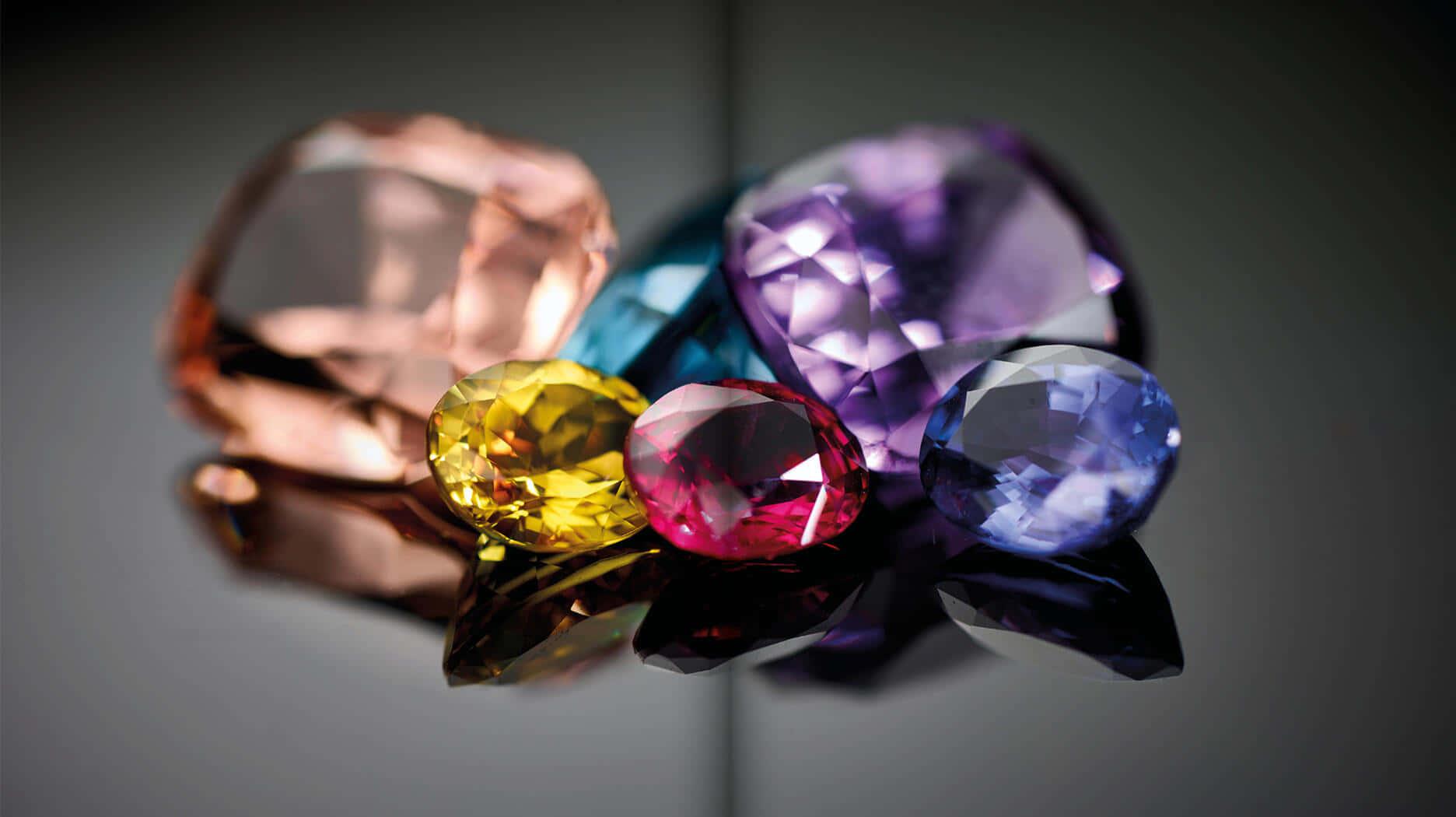 1872x1050 Download Caption: A vivid array of gleaming precious gemstones Wallpaper