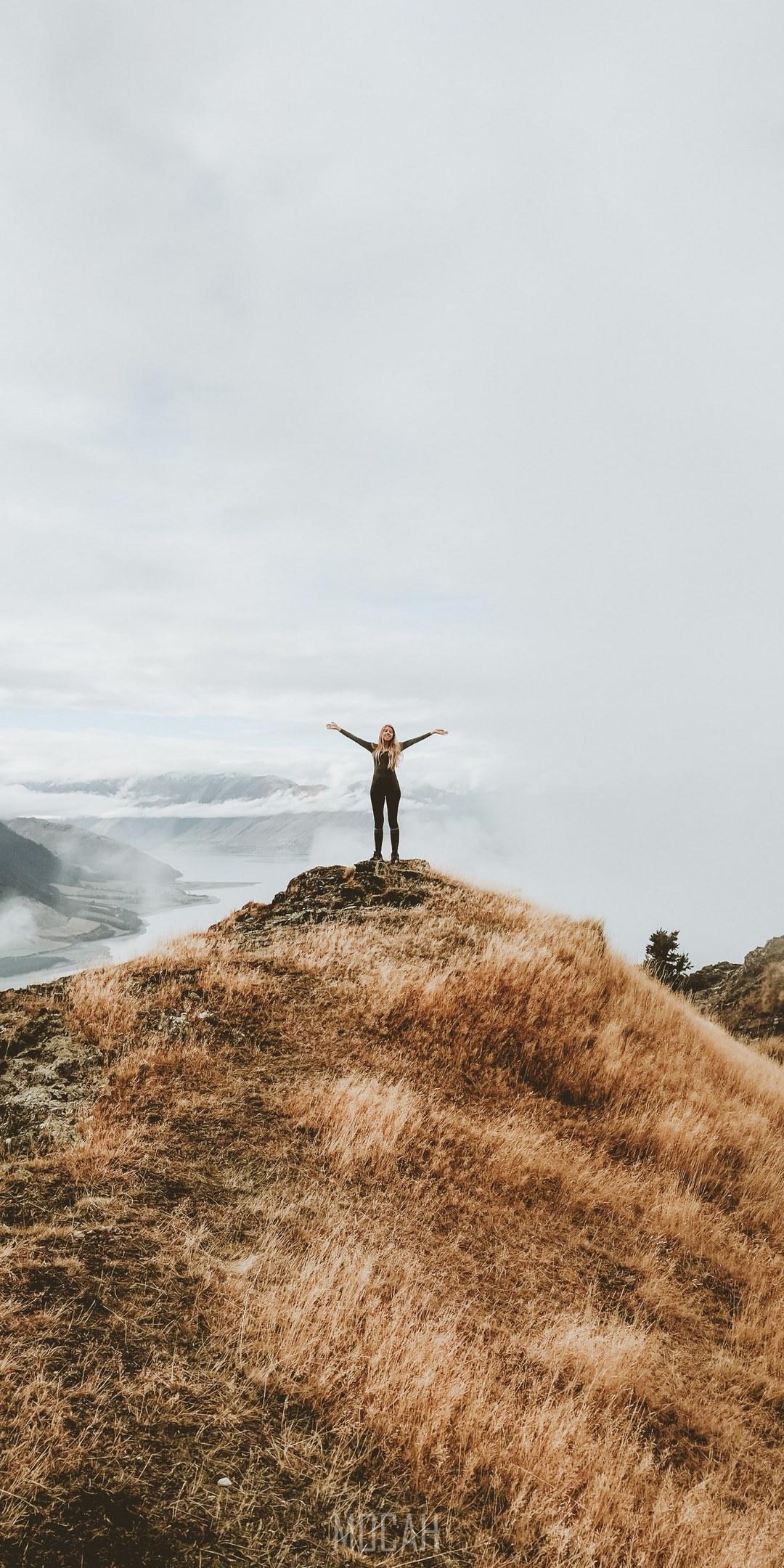1080x2160 a woman standing on a cliff with her arms spread open, _standing edge cliff, Google Pixel 4 wallpaper full hd, 1080x2280 Gallery HD Wallpaper
