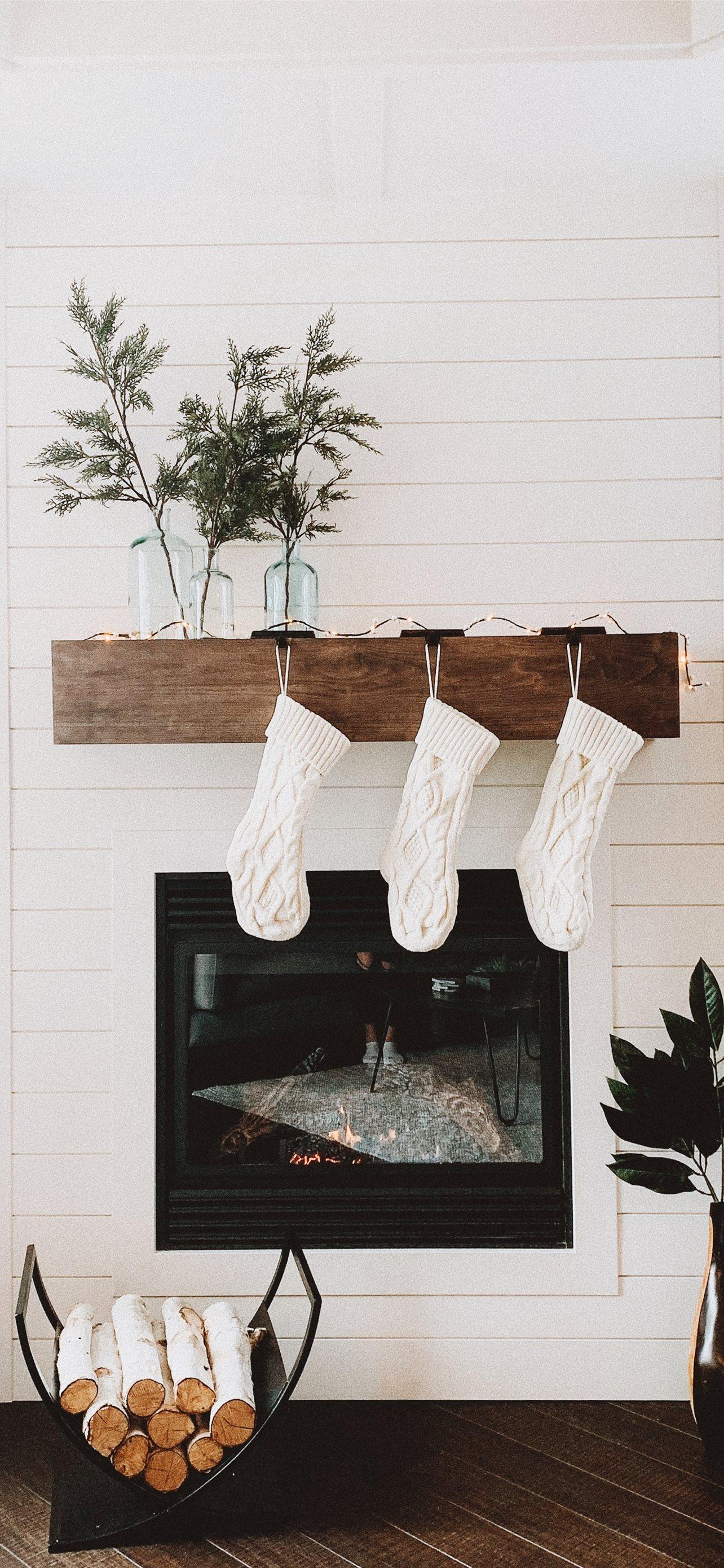 1284x2778 firewood on rack near fireplace iPhone Wallpaper Free Download
