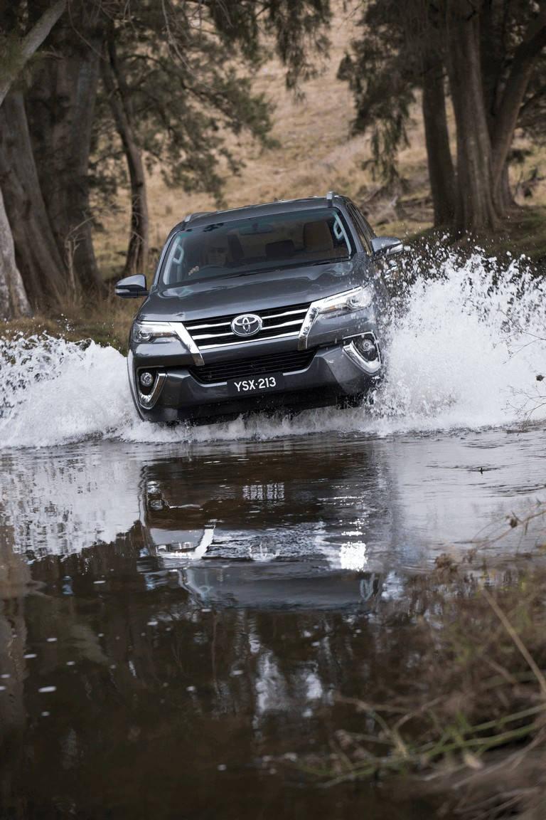 768x1152 Download Toyota Fortuner Off Road River Driving Wallpaper
