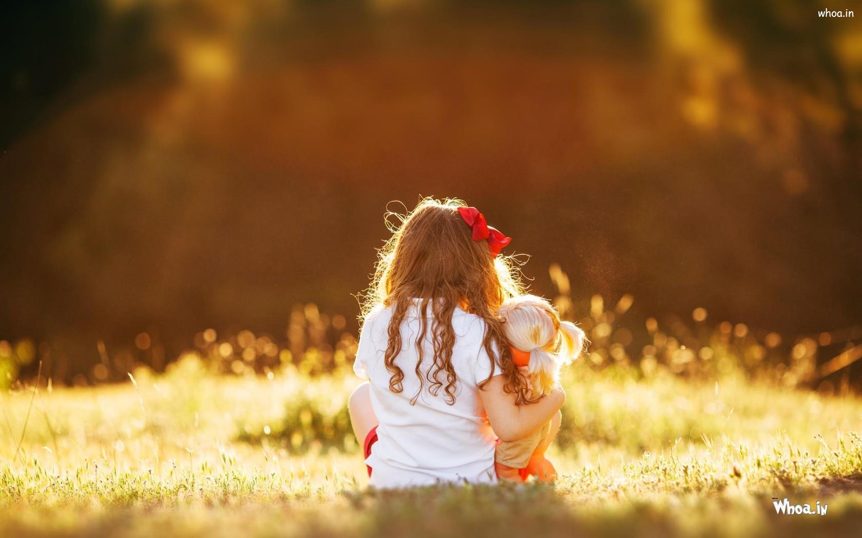 1680x1050 Little Child Girl With Baby Doll HD Cute Baby Wallpaper