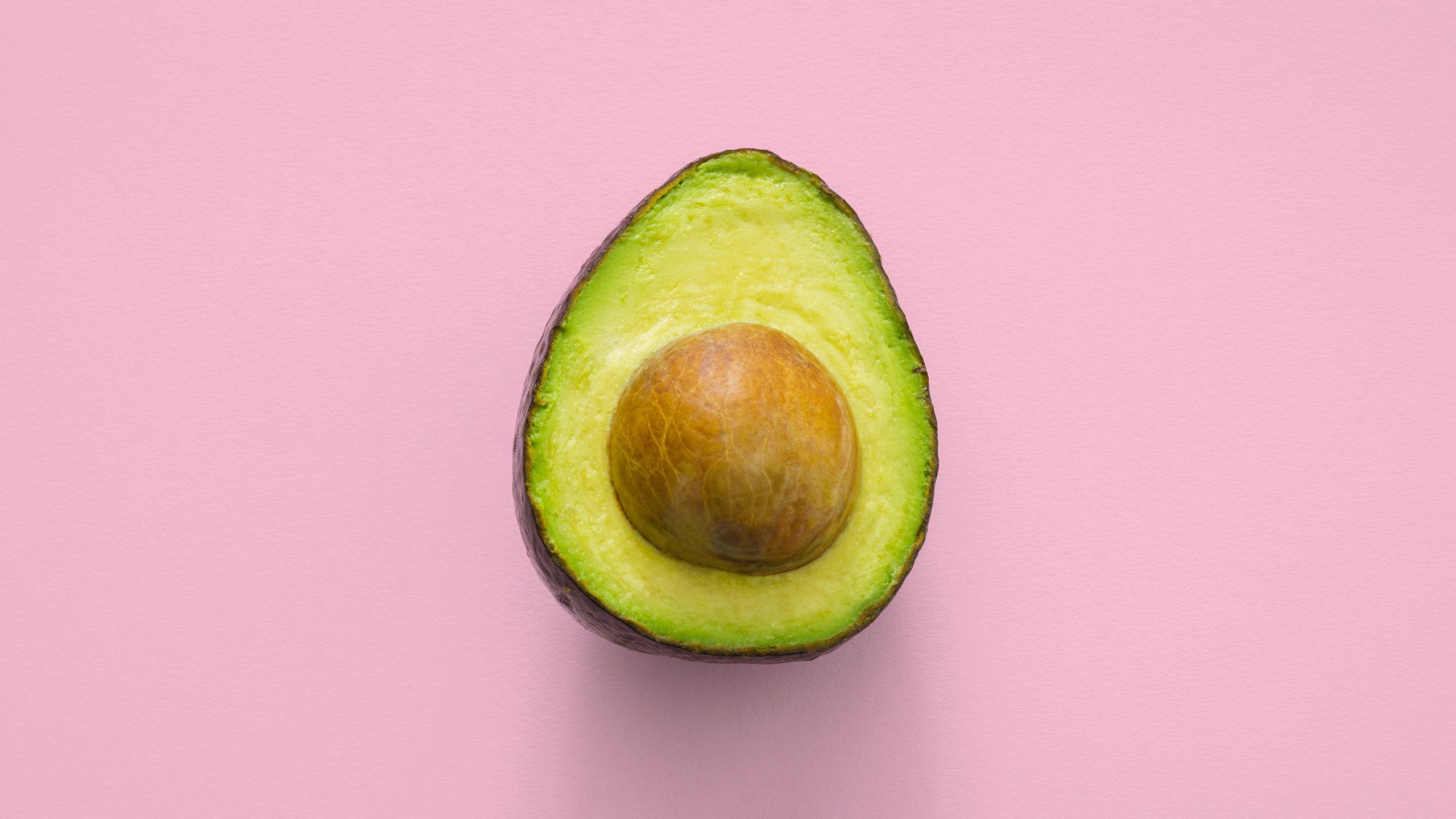 2560x1440 Download wallpaper 2560x1440 avocado, minimalism, pink widescreen 16