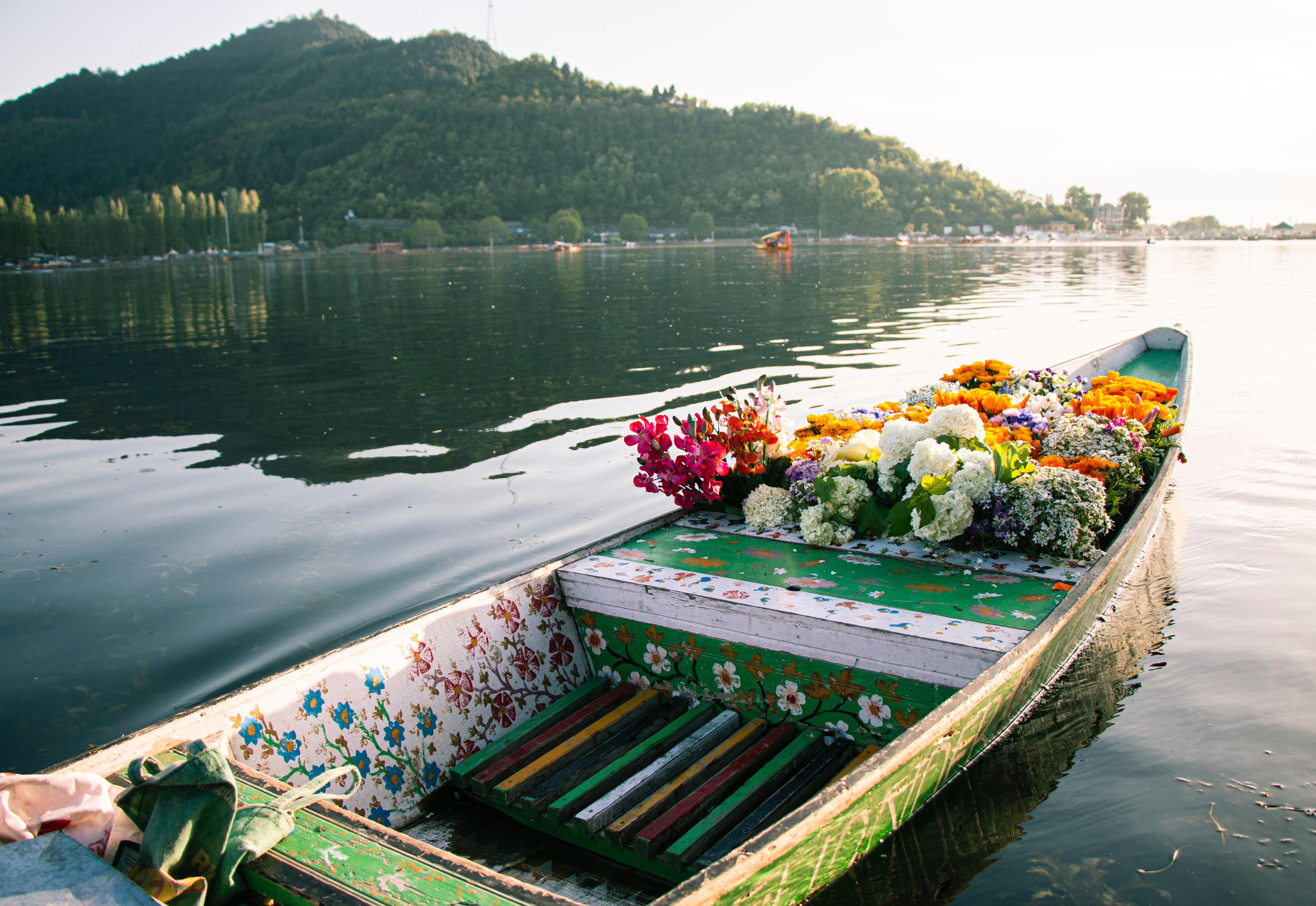 5300x3648 A Wooden Flower Boat on Dal Lake · Free