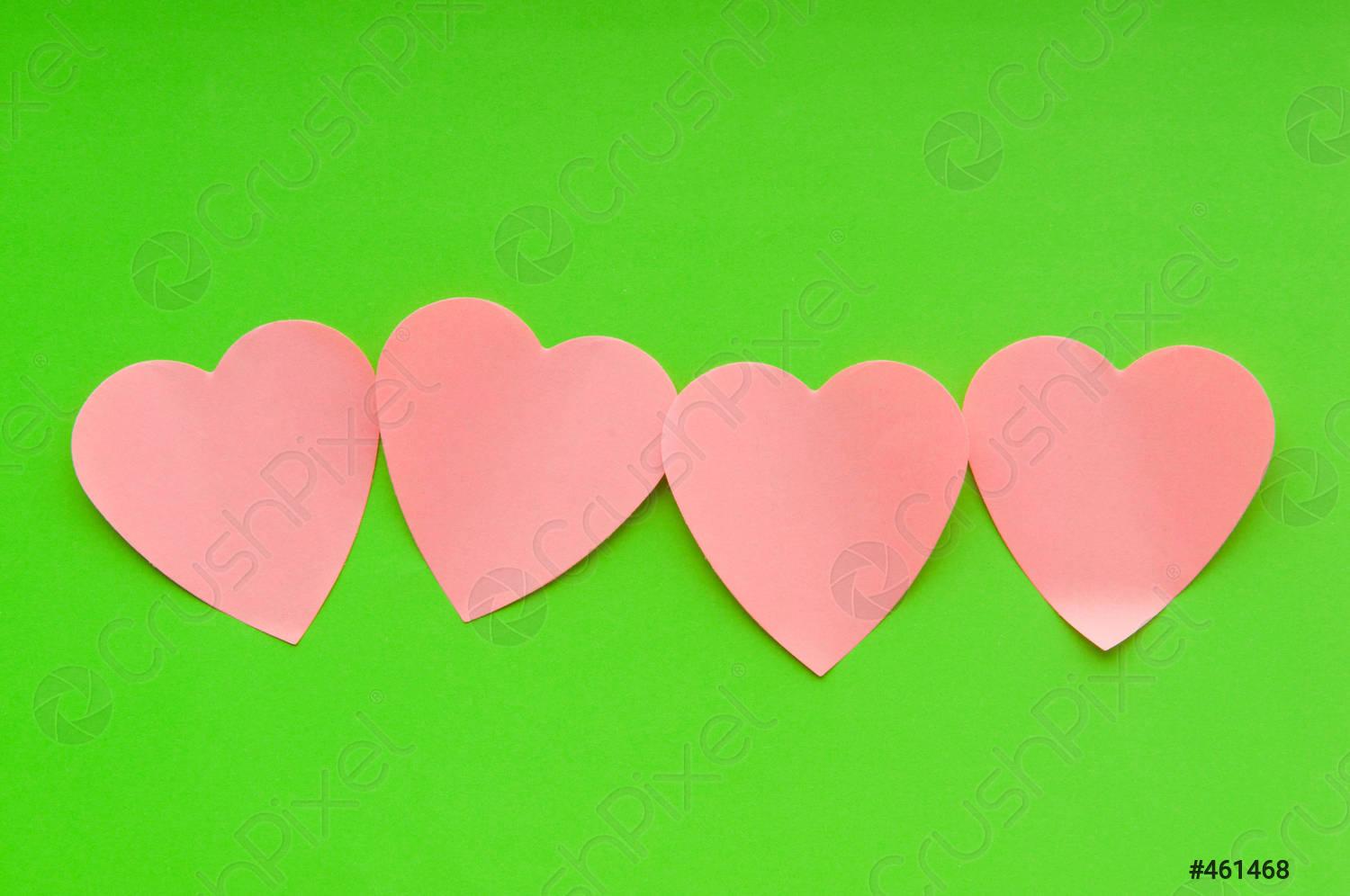 1500x996 Heart shaped sticky notes on the background