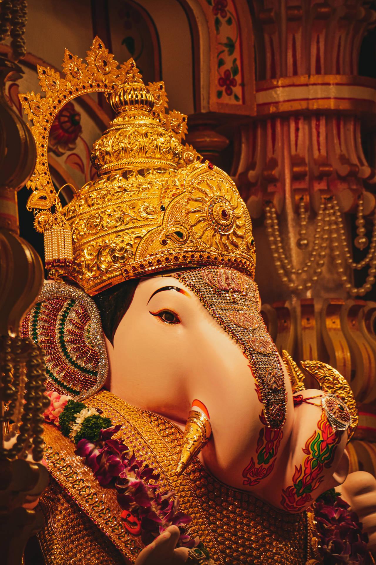 1280x1920 Download Ganesh 4k With Gold Accessories Wallpaper