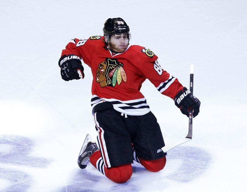 1024x795 Patrick Kane Celebration High Quality Wallpaper : Sports