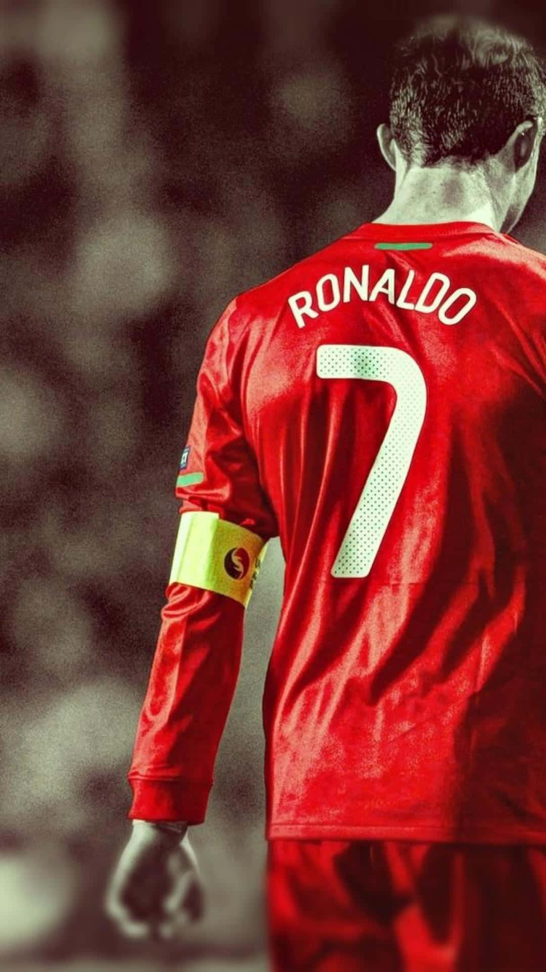 1080x1920 Download Cristiano Ronaldo displays skill as he dribbles the ball among defenders Wallpaper