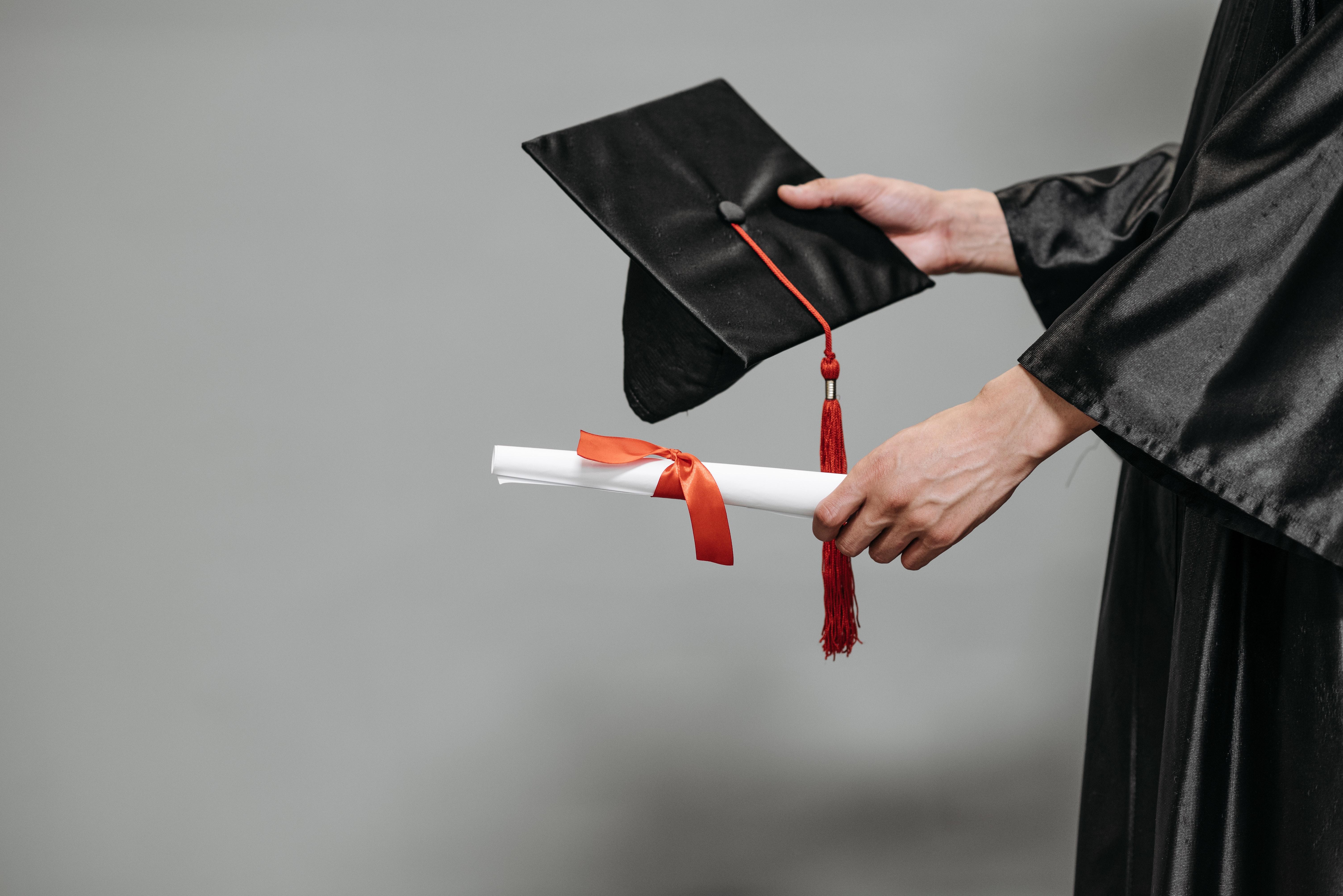 6016x4016 Photo of Person Holding Graduation Cap and Diploma · Free