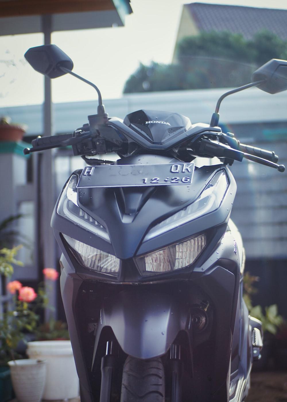 1000x1400 A motorcycle parked on the side of a