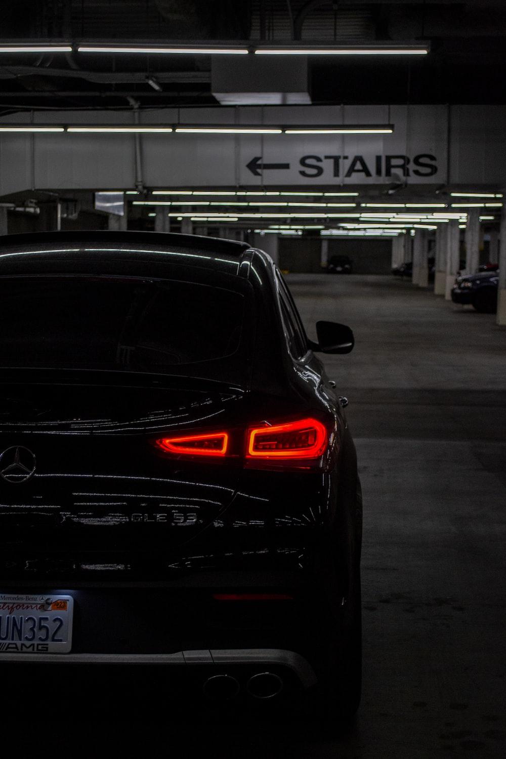 1000x1500 A car is parked in a parking garage