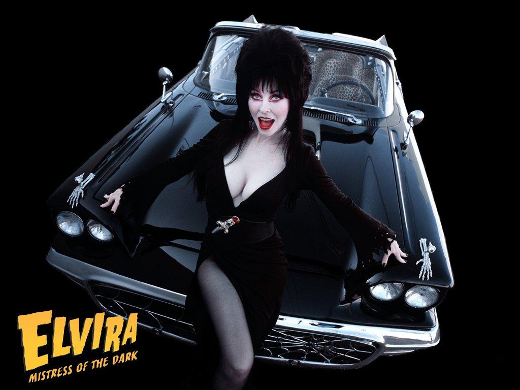 1024x768 Elvira Mistress of the Dark with Car mid Modeling (8 inch by 10 inch) PHOTOGRAPH TL at Amazon's Entertainment Collectibles Store