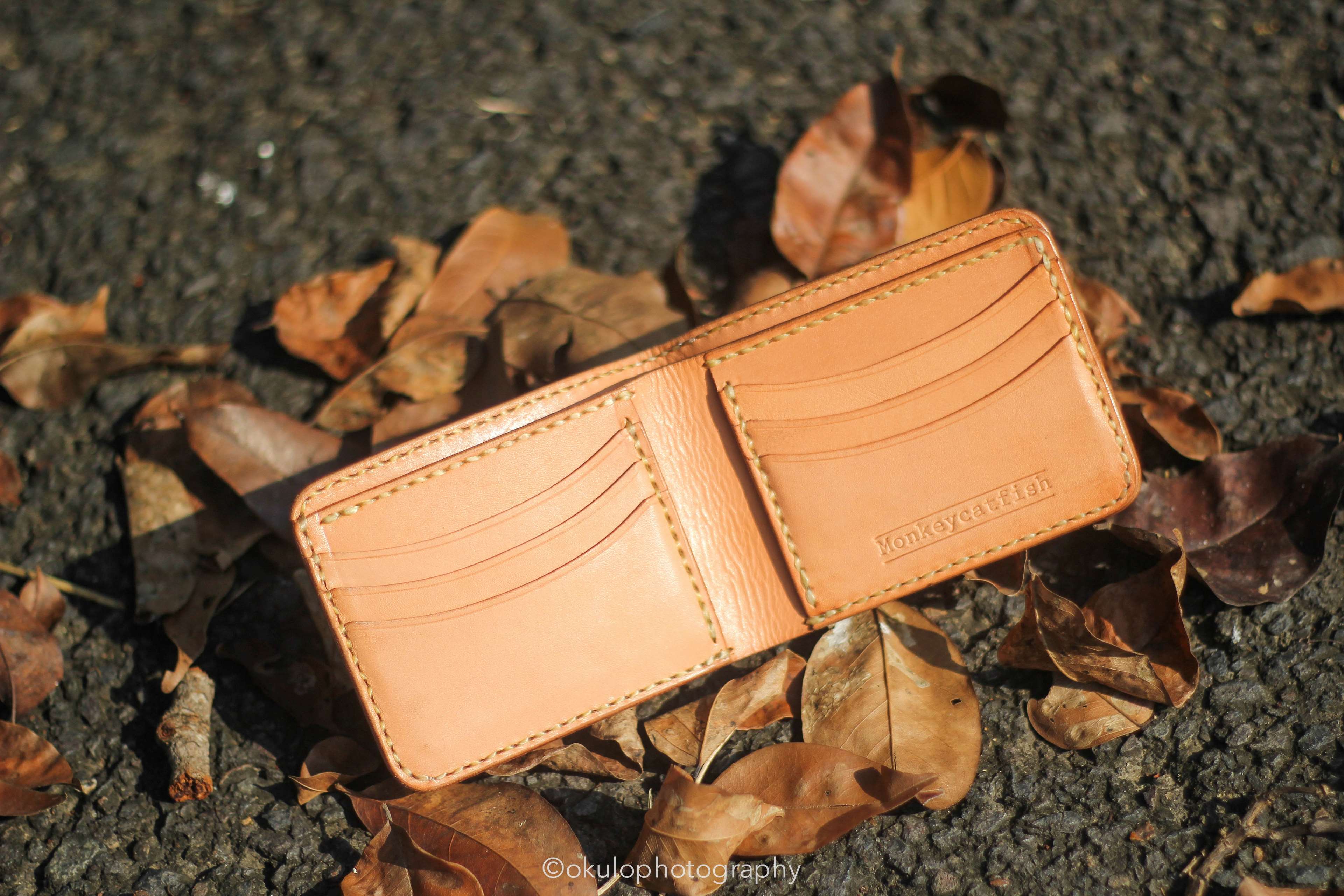3840x2560 brown, classic, dark, indonesia, leafs, leather, street, wallet 4k wallpaper