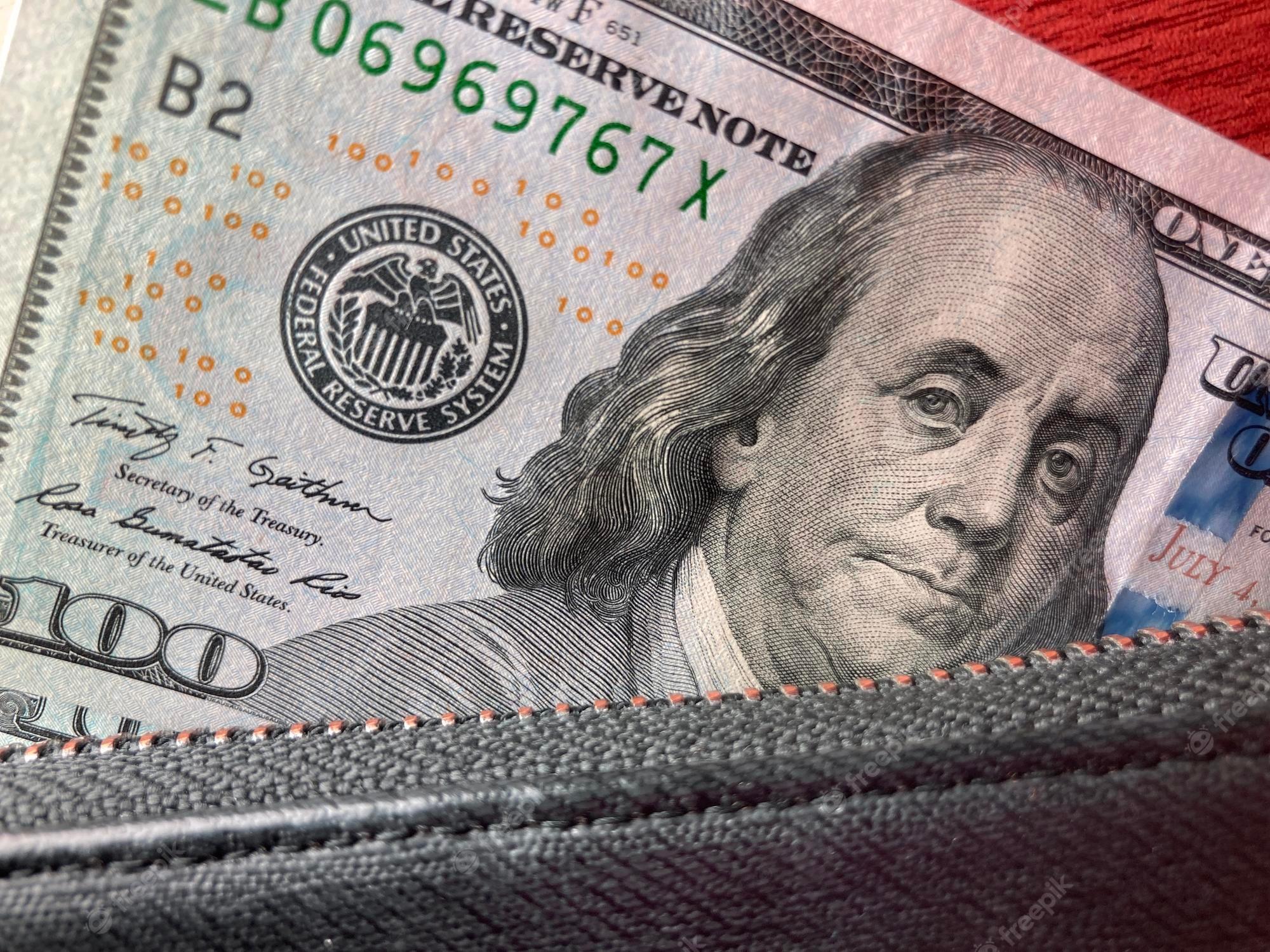 2000x1500 Premium Photo. Background 100 dollars in wallet 100 dollars wallpaper with dollars moneys