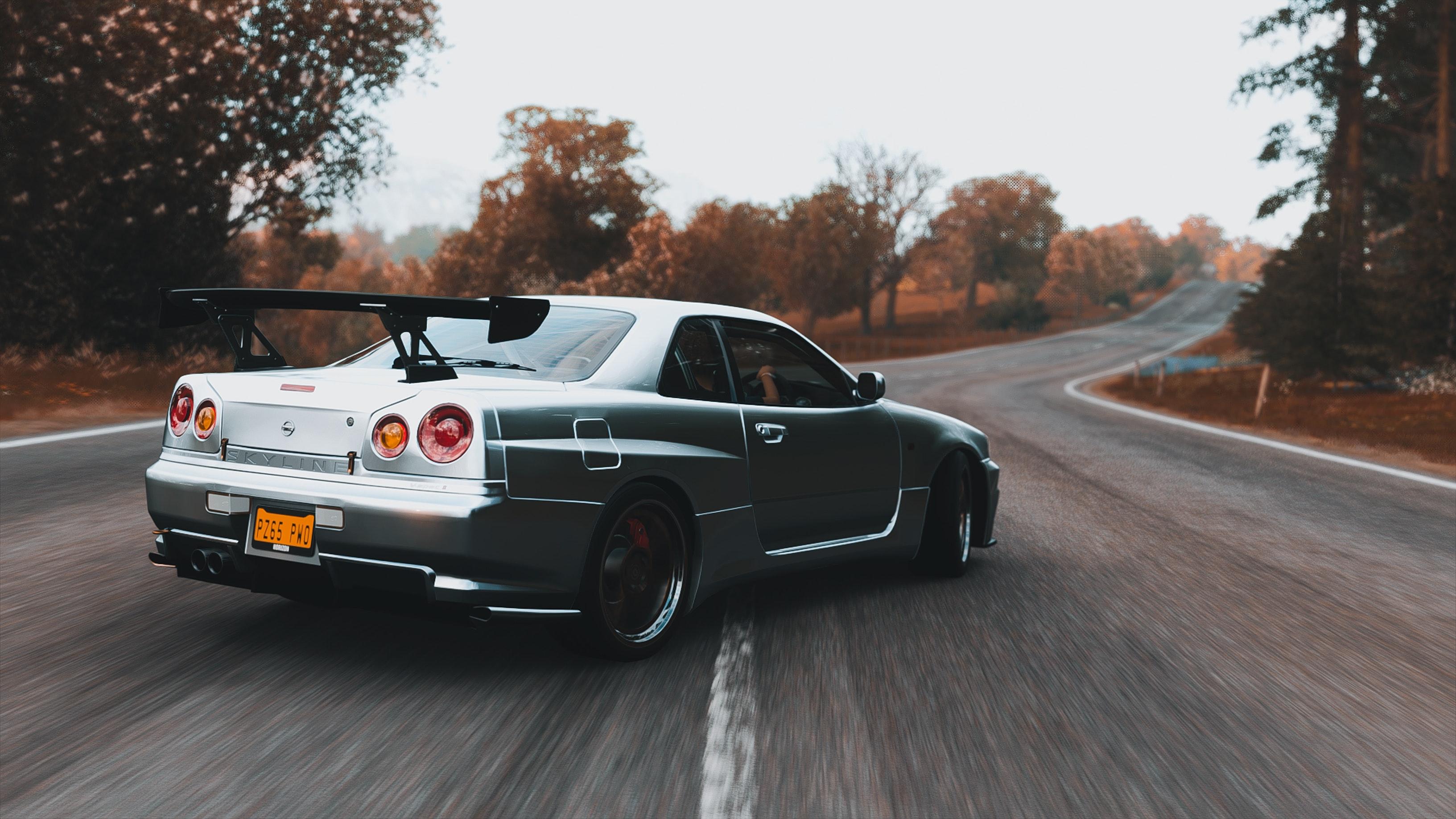 3265x1837 Gray Nissan Skyline Drifting on Road · Free