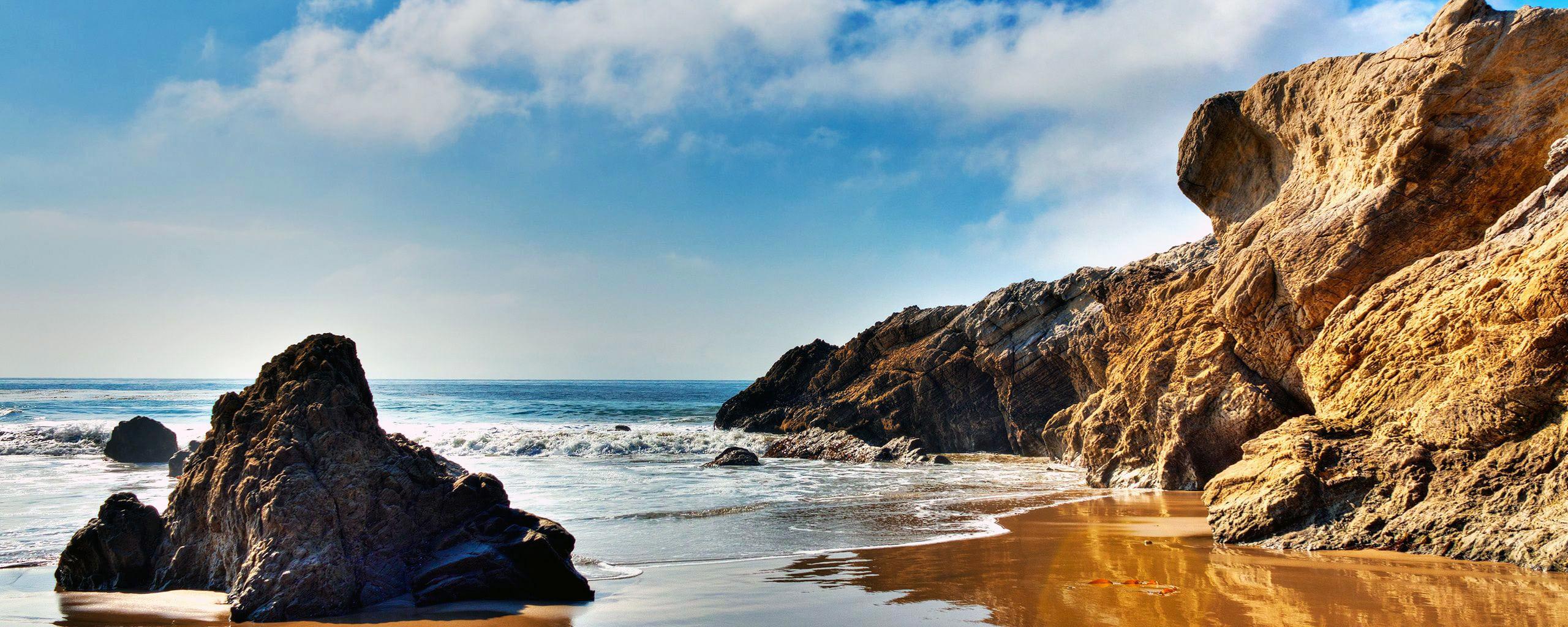 2560x1024 The wallpaper of beach at the Pacific Ocean in Malibu, California