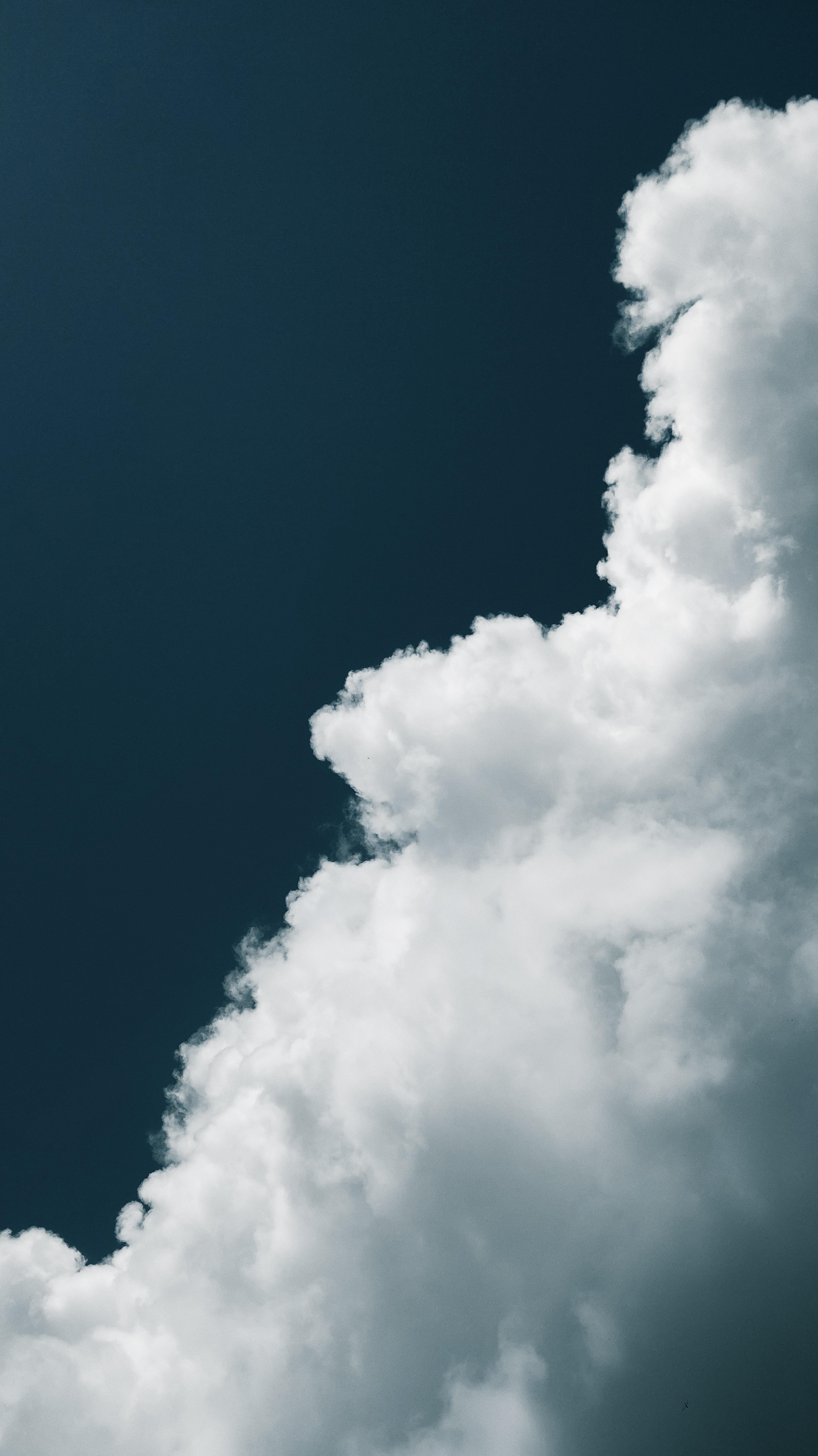 3991x7095 White Clouds and Dark Blue Sky · Free
