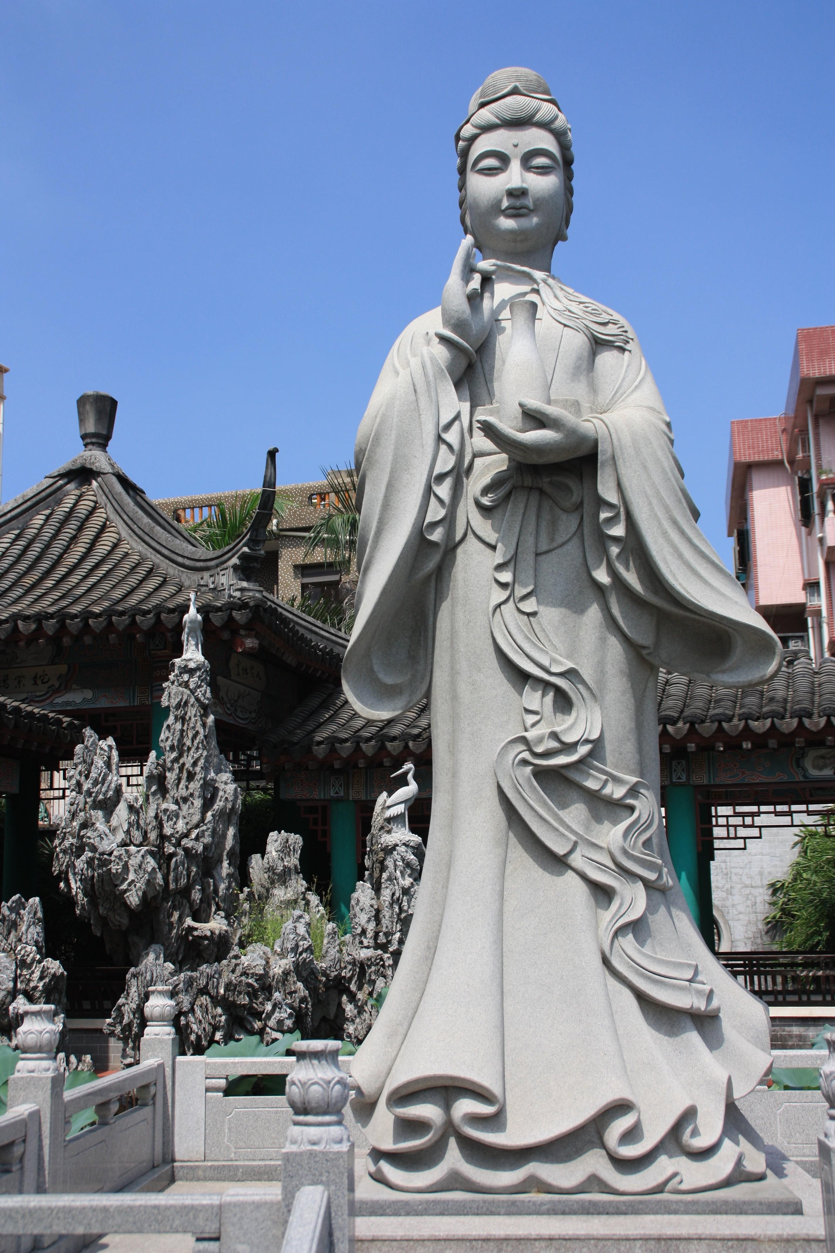 2848x4272 Wallpaper / stone, sky, belief, no people, craft, nature, 4K, guanyin, female likeness, sculpture, place of worship, plant, temple, representation, built structure free download
