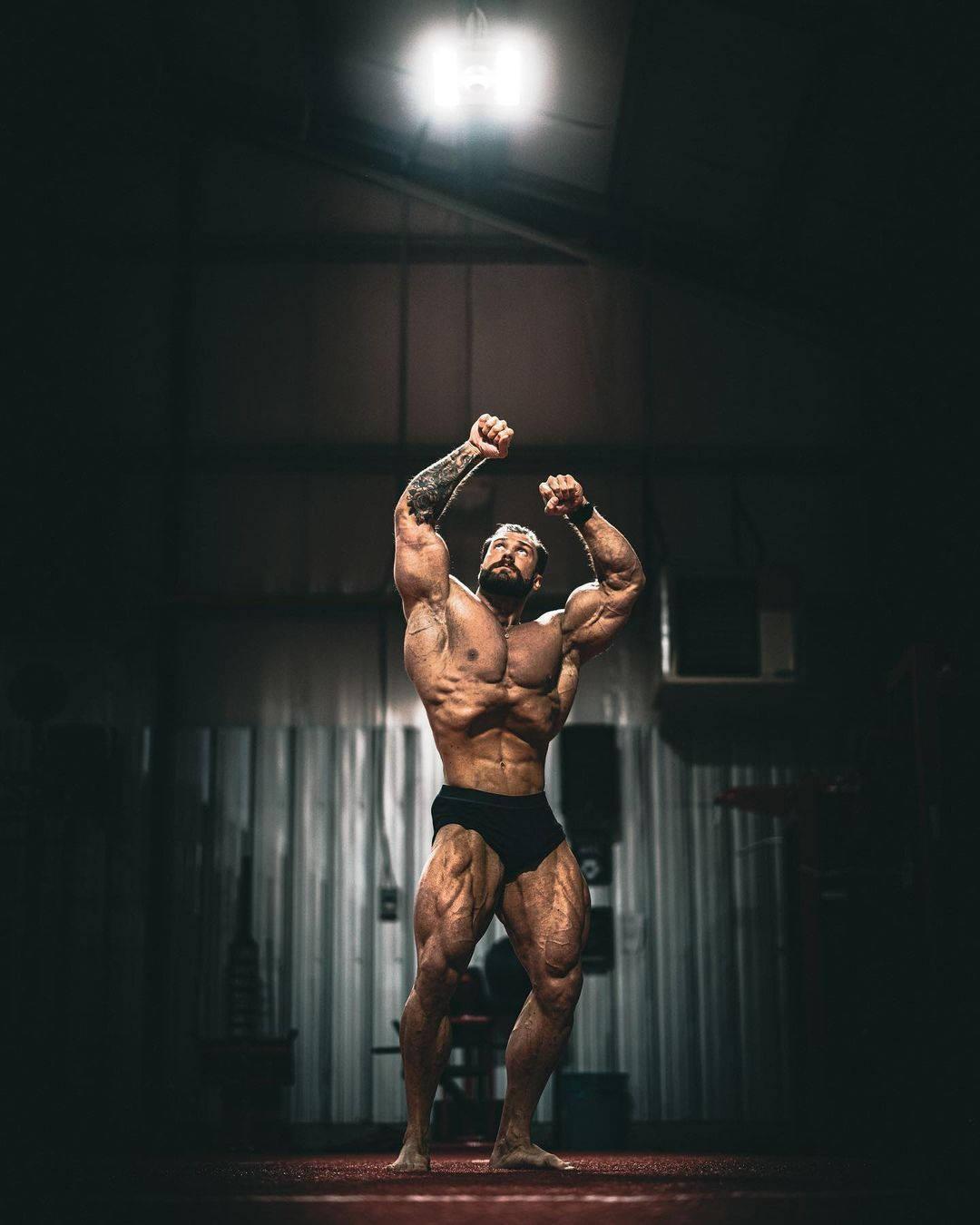 1080x1350 Download Chris Bumstead Vacuum Bodybuilding Pose Wallpaper