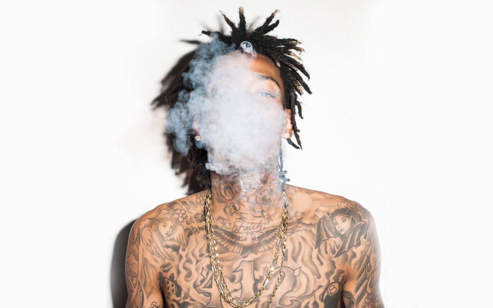 1680x1050 HD Wallpaper Of Wiz Khalifa Blowing Out Smoke