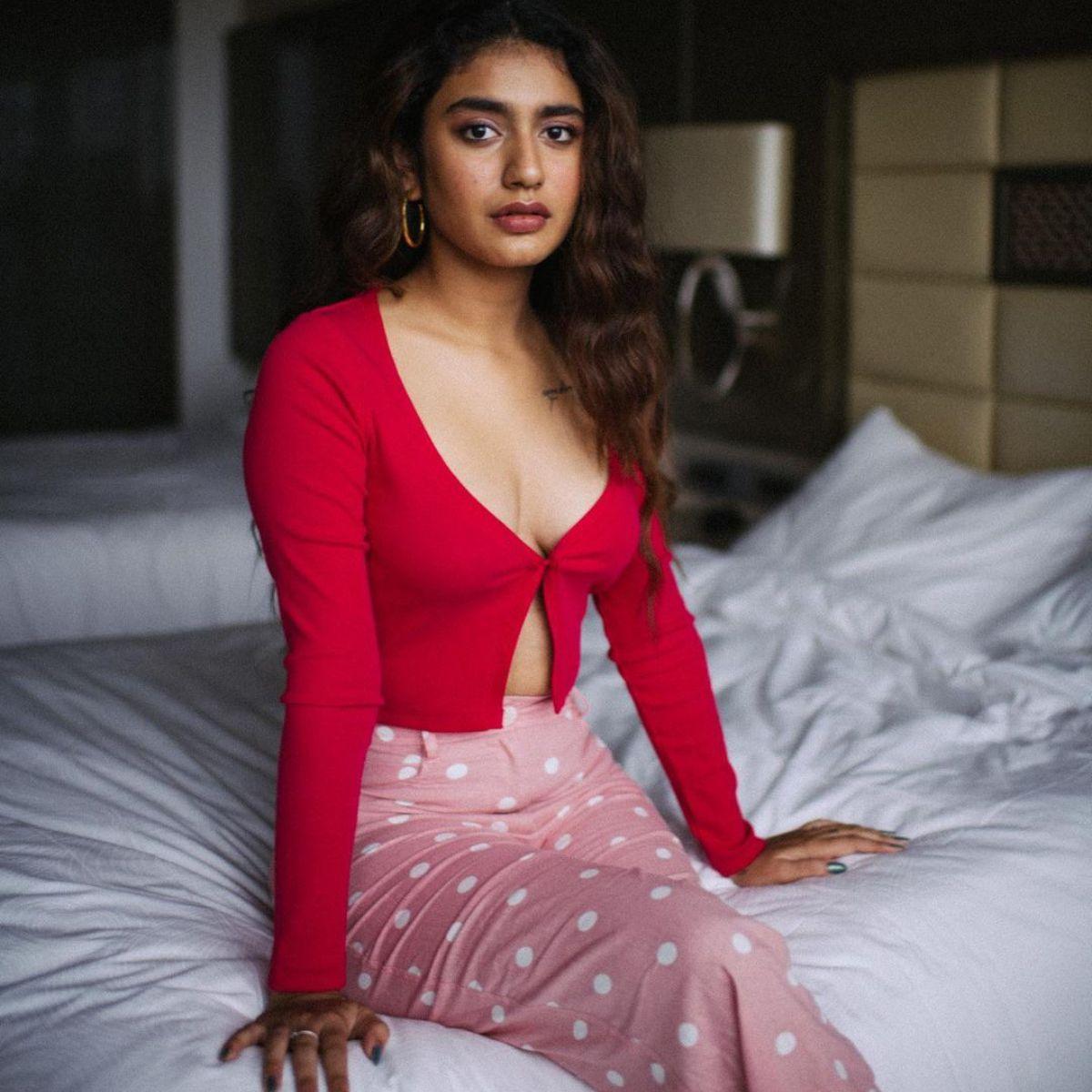 1200x1200 Priya Prakash Varrier looks alluring in a red top with a plunging neckline in her latest PHOTOS