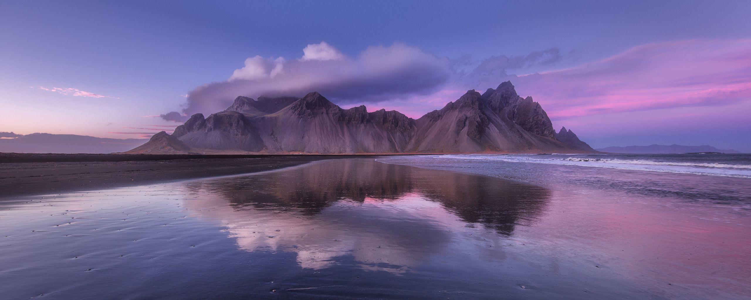 2560x1024 Download wallpaper 2560x1024 mountain, clouds, coast, iceland ultrawide monitor HD background