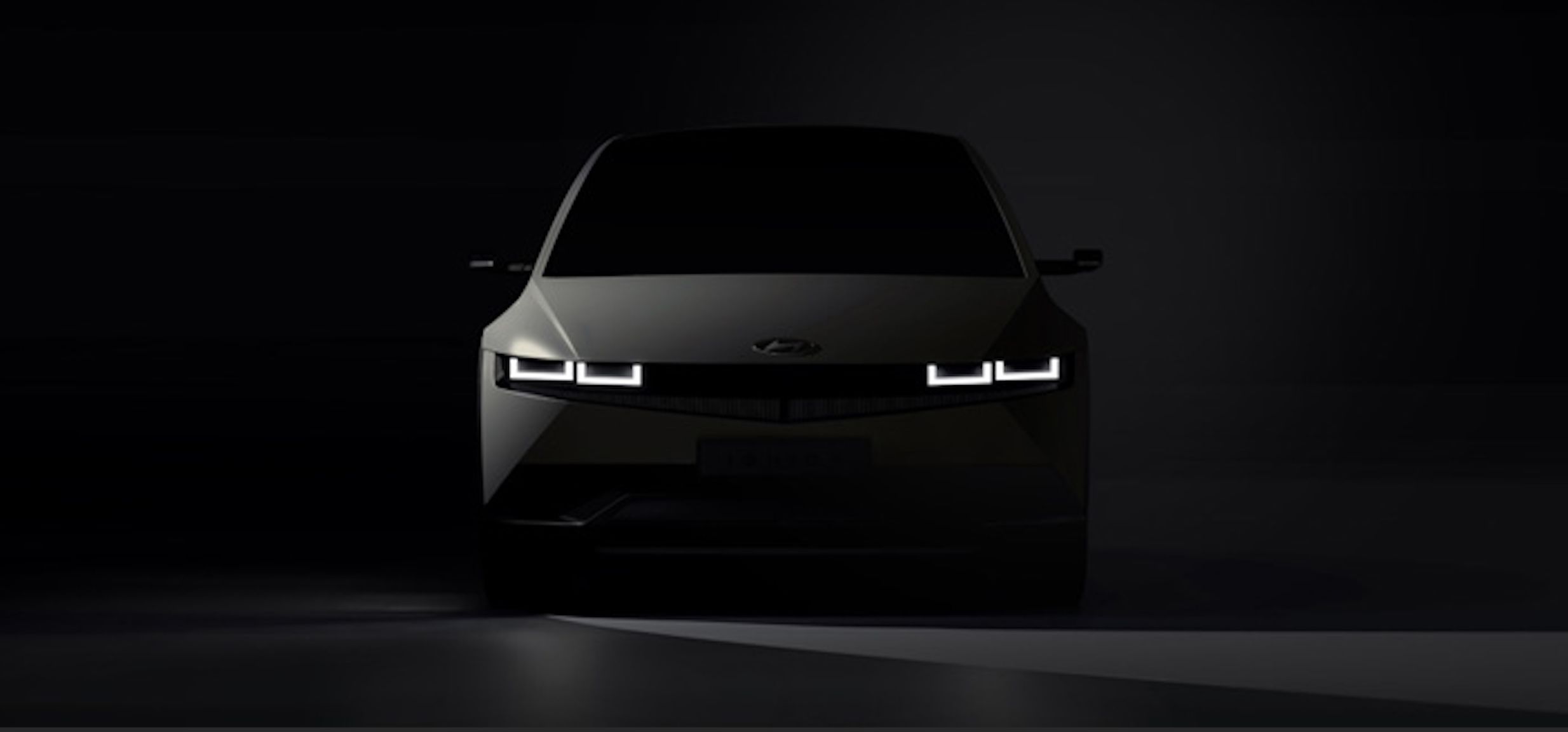 2468x1152 Hyundai releases new image of the IONIQ 5 electric car, makes vague claim about fast charging