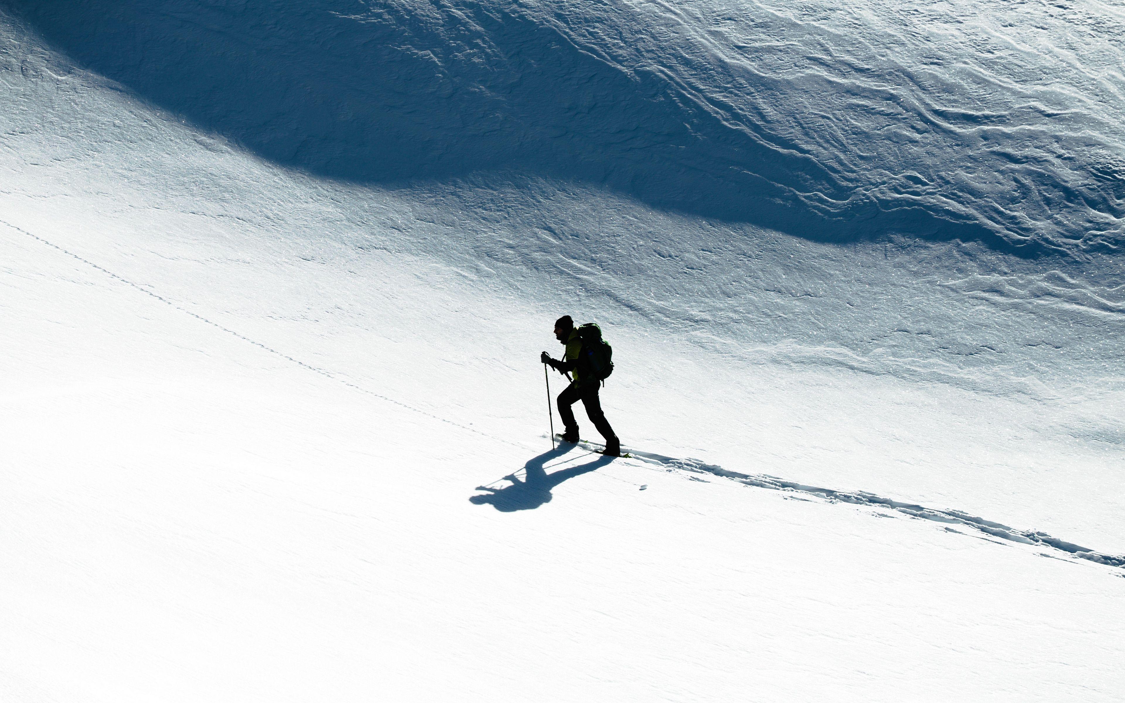 3840x2400 Download wallpaper 3840x2400 skier, snow, climb, winter, sport 4k