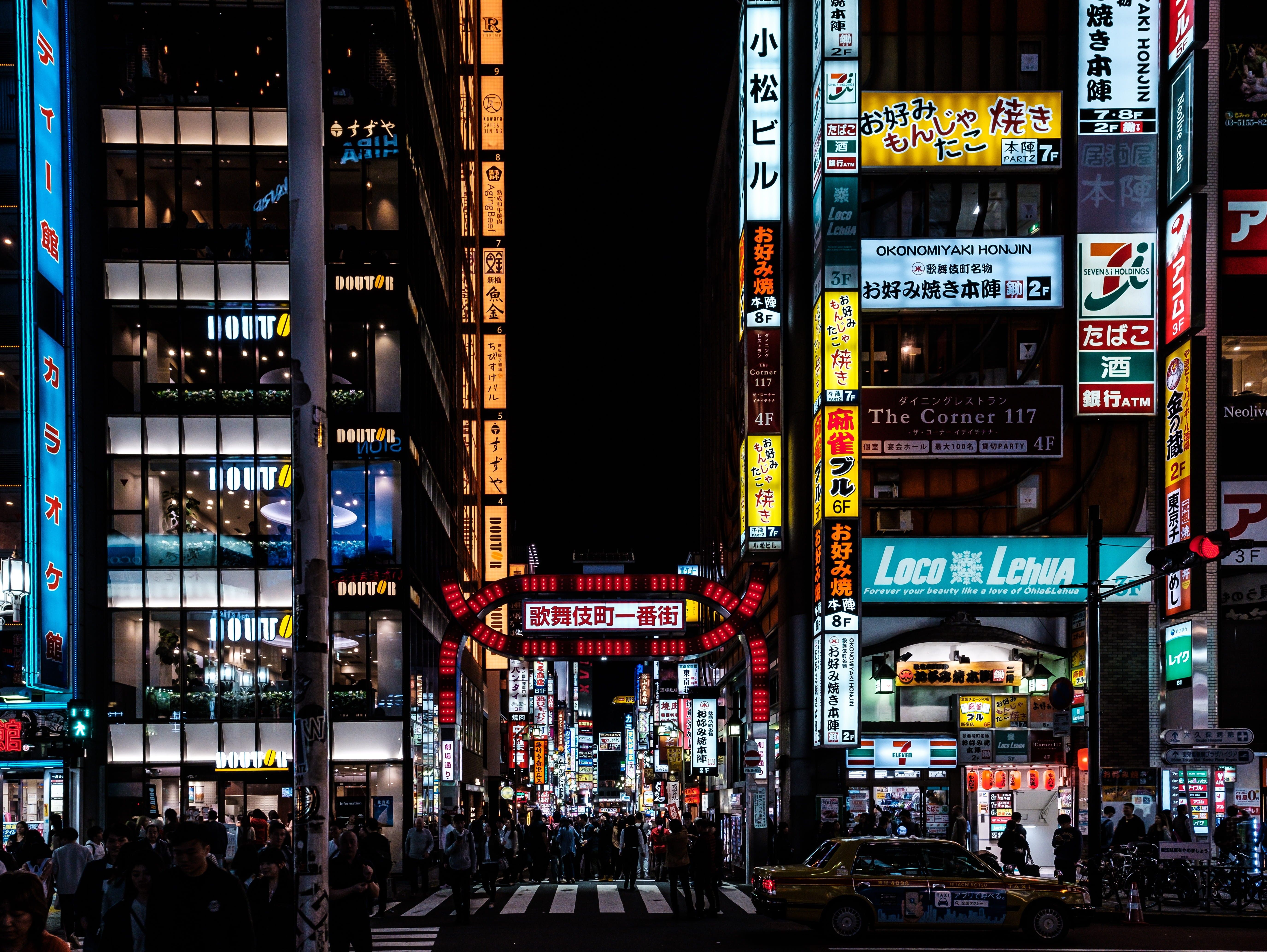 5500x4136 Wallpaper / crowd, nightlife, 5K, the hustle and bustle, japan, communication, illuminated, shinjuku, street, the city at night, skyline, signages, travel destinations free download