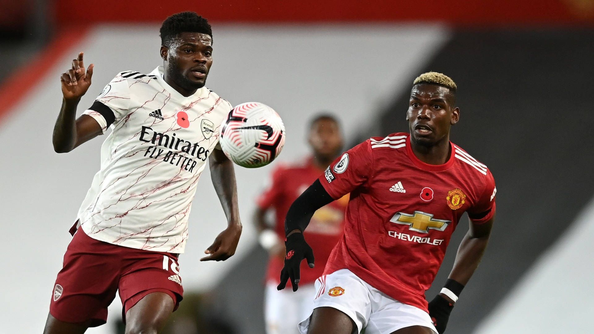 1920x1080 Download Thomas Partey Running Alongside Another Player Wallpaper