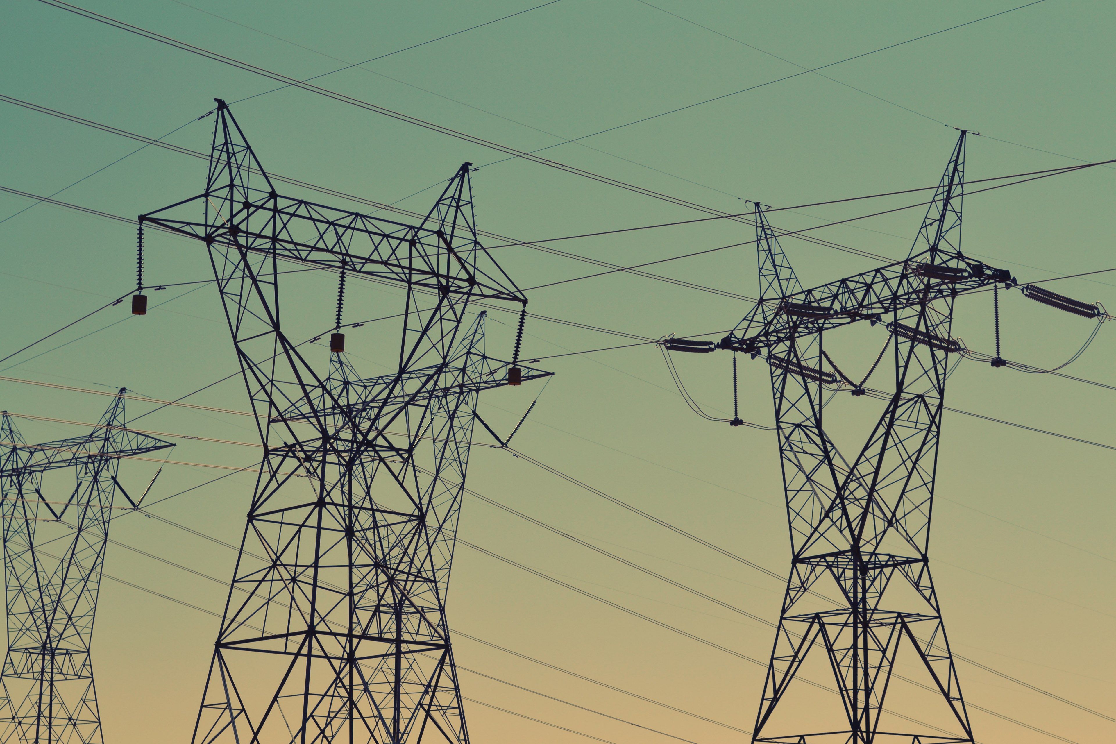 3840x2560 Wallpaper / electrical towers and grids of power lines against a sky at sunset, power line grids 4k wallpaper free download