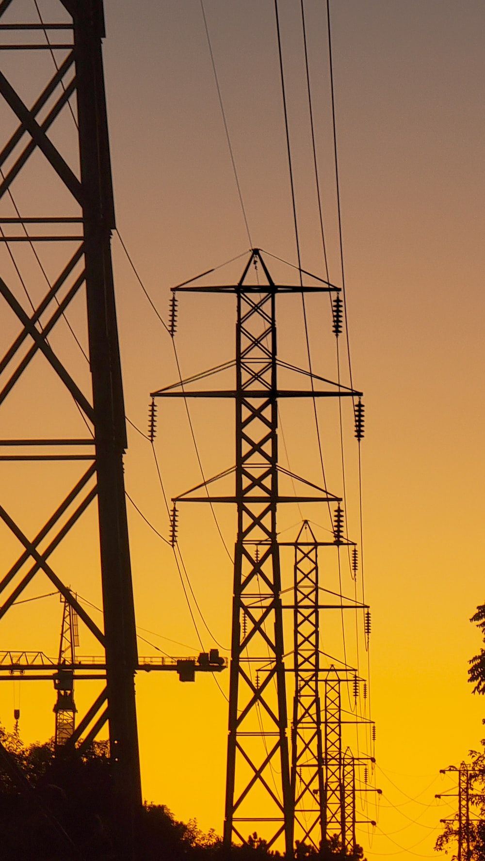 1000x1776 A couple of power lines that are next to each other photo