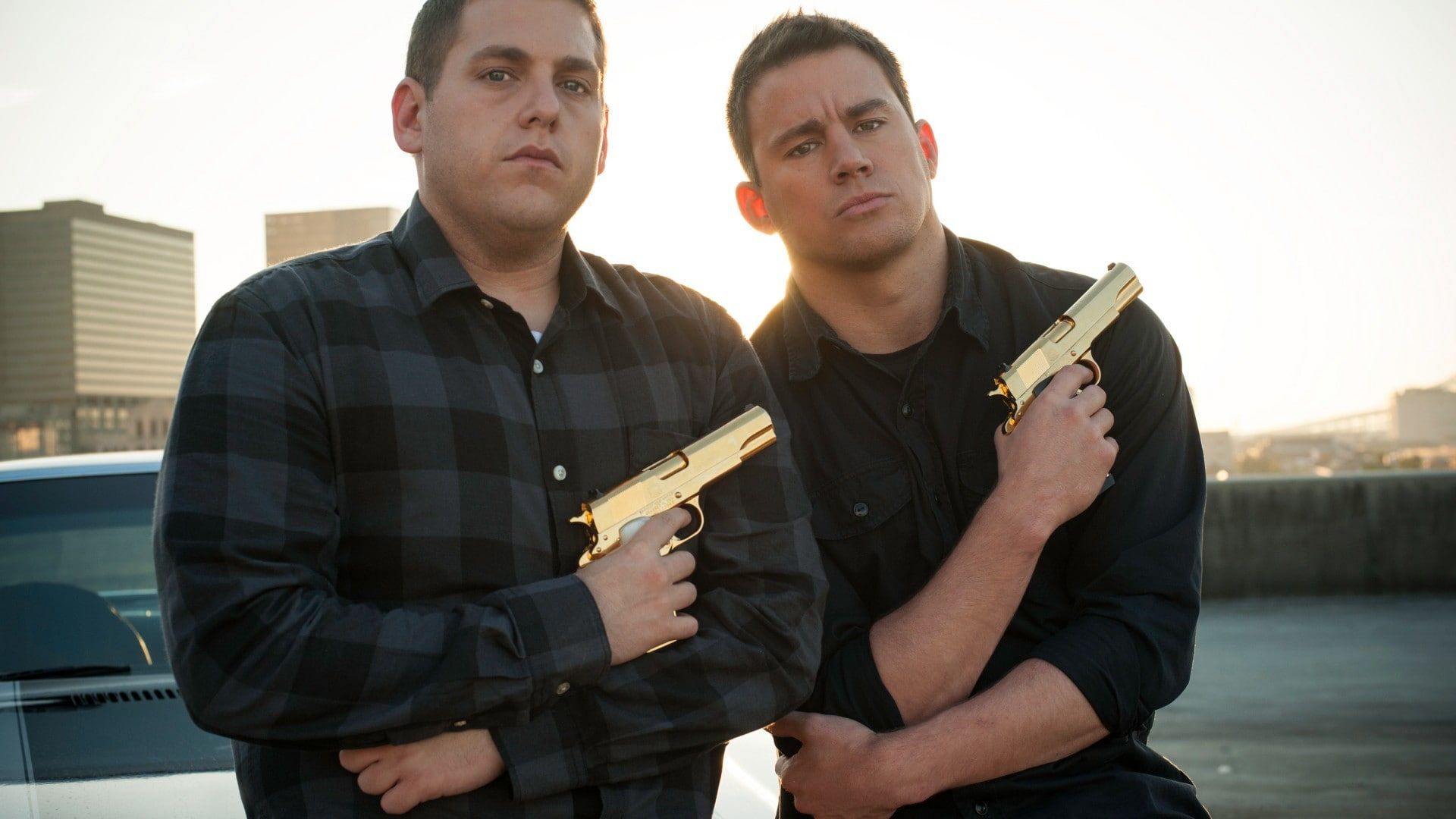 1920x1080 Wallpaper / movies, Jump Street, waist up, portrait, mid adult men, adult, architecture, holding, gold, law, 1080P, two people, young men, gun, city, outdoors, Channing Tatum free download