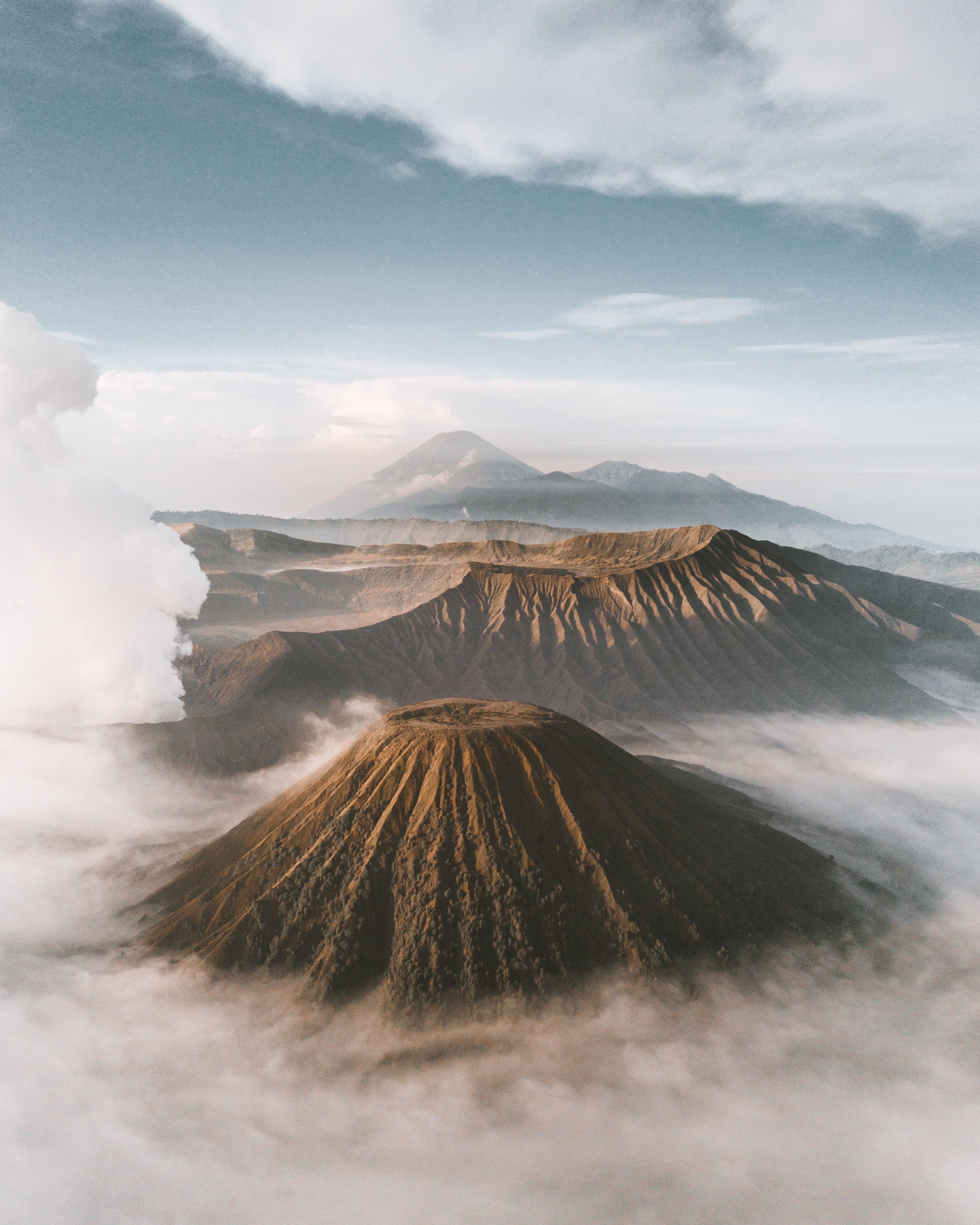 2992x3740 Sunrise above the clouds in the Tengger Massif of Bromo Tengger Semeru National Park. East Java Indonesia. 2992x3. East java, Earth photography, Above the clouds