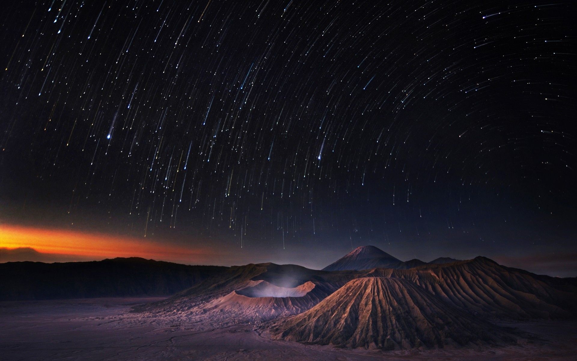 1920x1200 Star Rain Over Volcanos desktop PC and Mac wallpaper