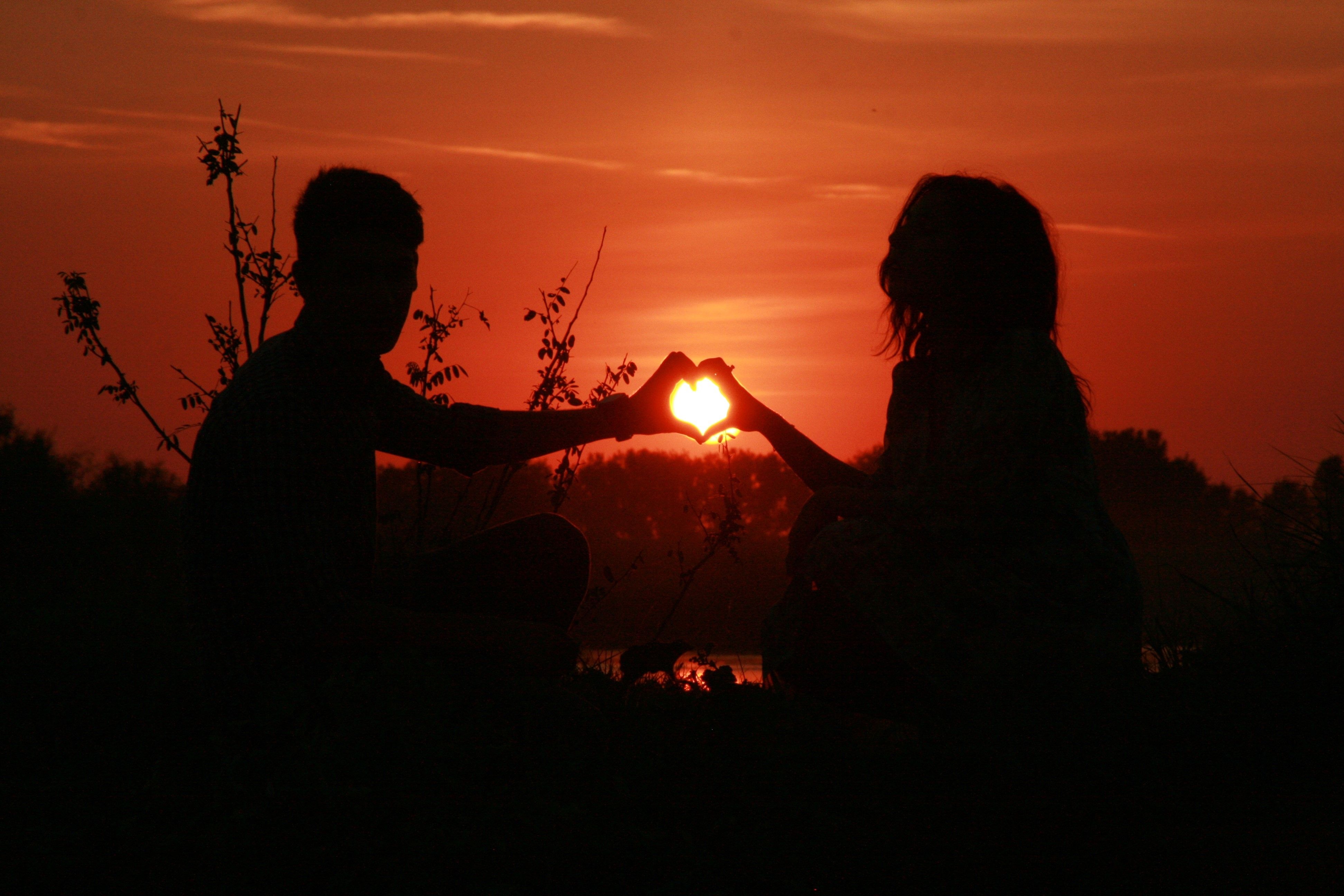 3888x2592 Wallpaper / burning, men, leisure activity, people, togetherness, sun, two people, couple, women, silhouette, outdoors, sunset, real people, bonding, water, making free download