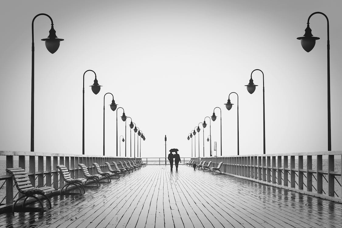 1125x750 Two People Walking on Pier · Free