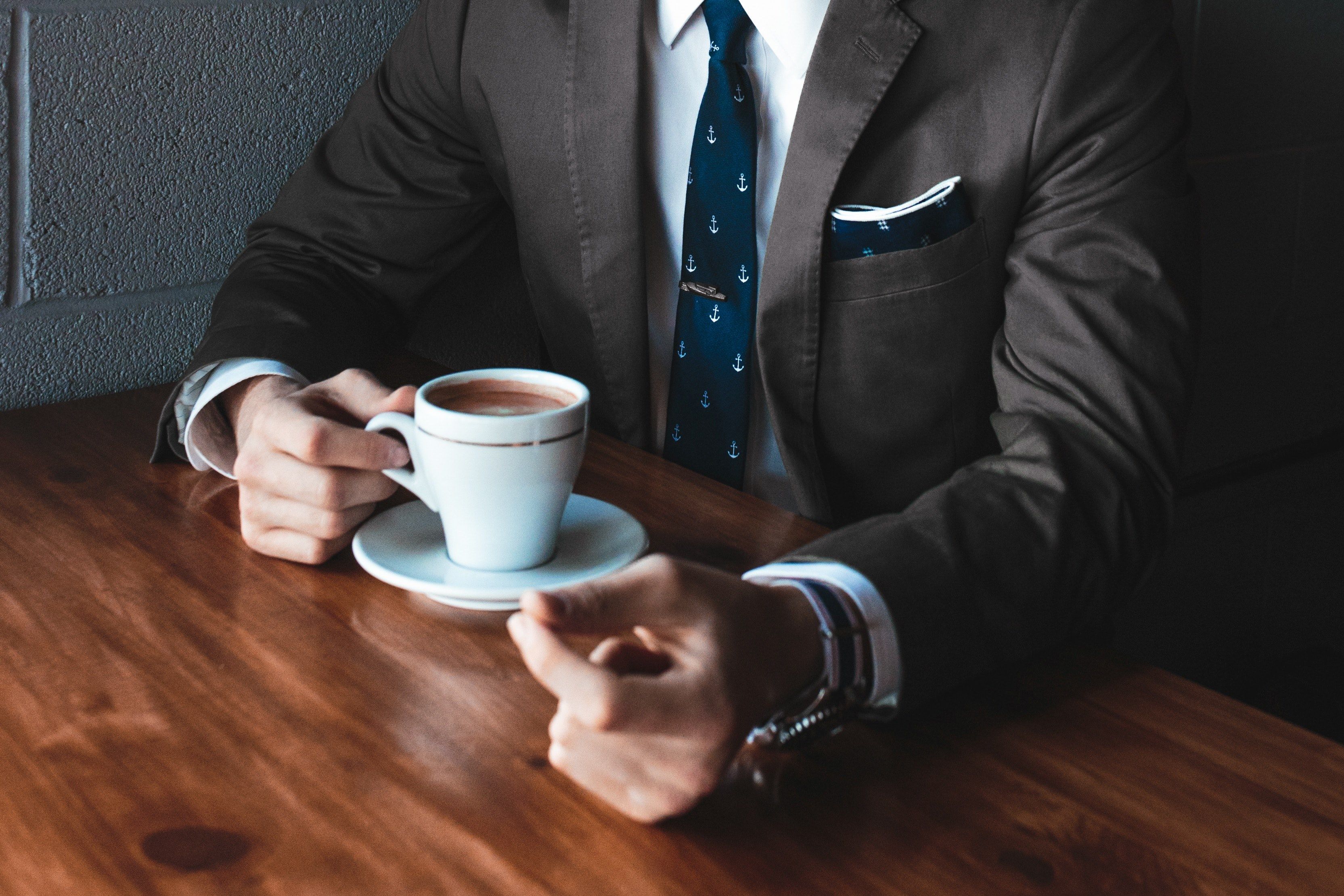 3330x2220 Wallpaper / a businessman in a black suit and a tie drinking coffee at a table, damn fine coffee 4k wallpaper free download