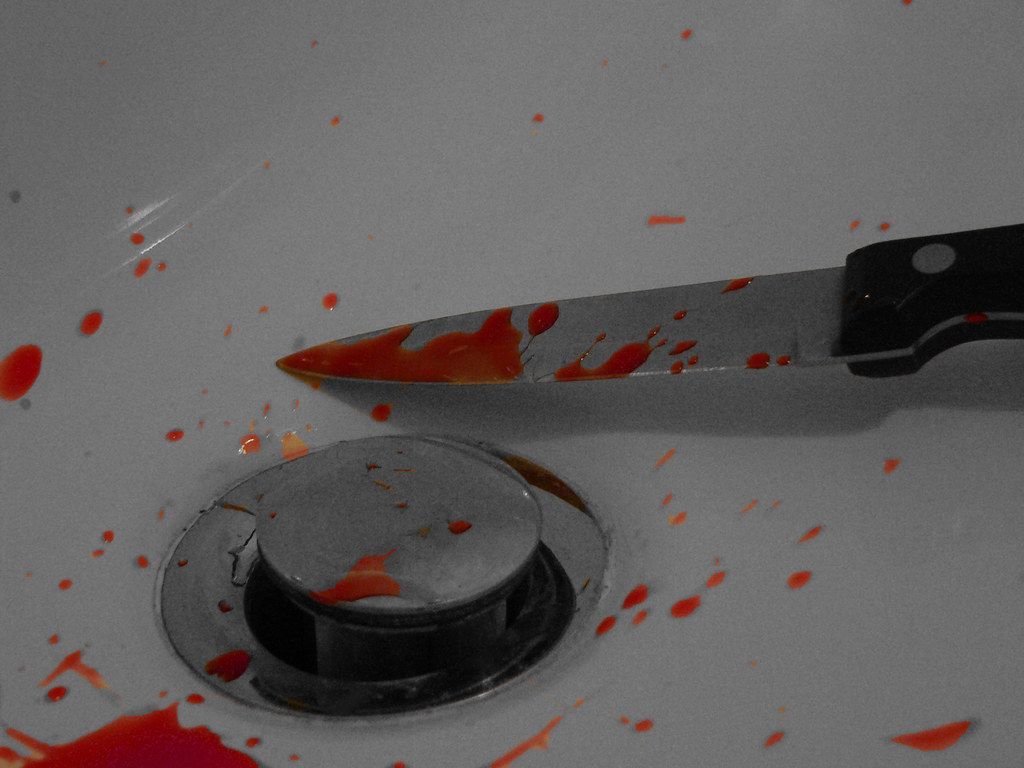 1024x768 Bloody knife. Its not real blood obviously, but its sauce a